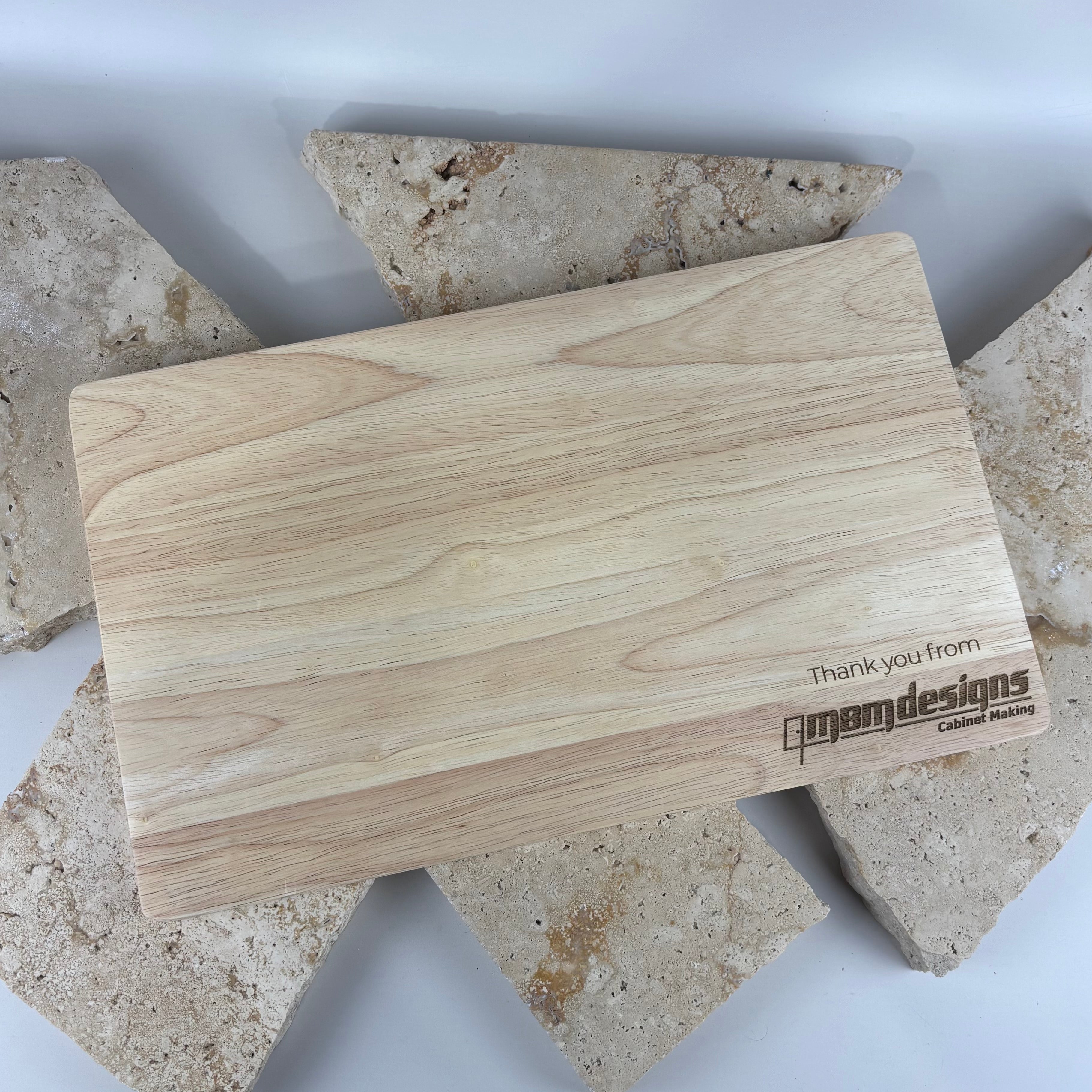 Custom engraved wooden serving board with personalised business logo on the reverse. Premium rubberwood chopping and grazing board, laser engraved with custom branding, ideal for corporate gifts, client thank you gifts, promotional merchandise, settlement gifts and branded kitchenware.