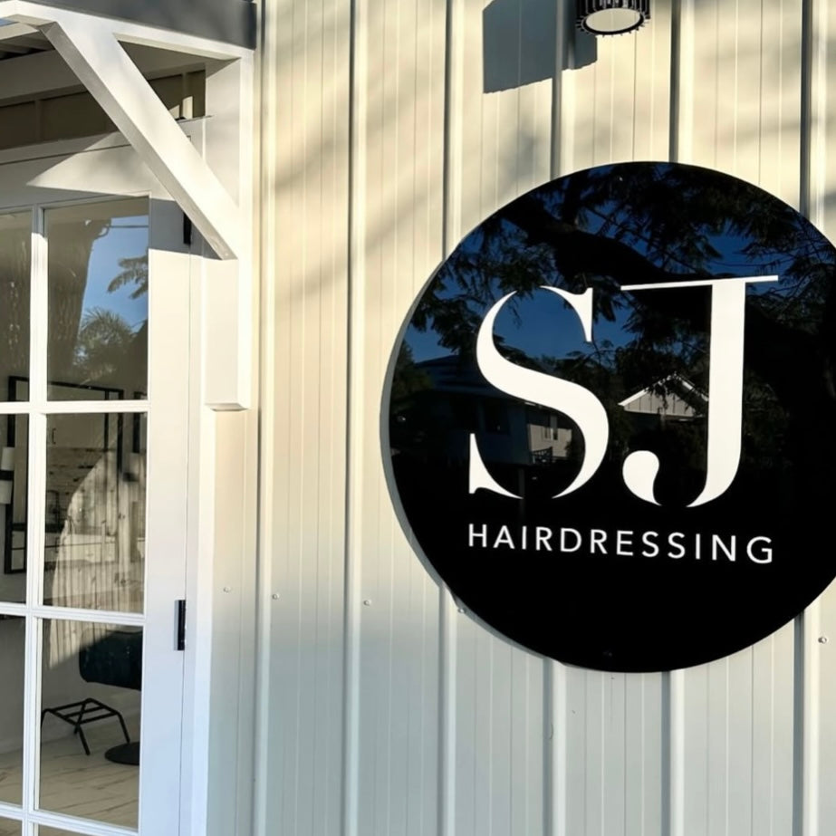 Custom round 3D acrylic business sign installed on salon exterior, acrylic wall signage Australia, hairdressing shopfront sign with bold logo