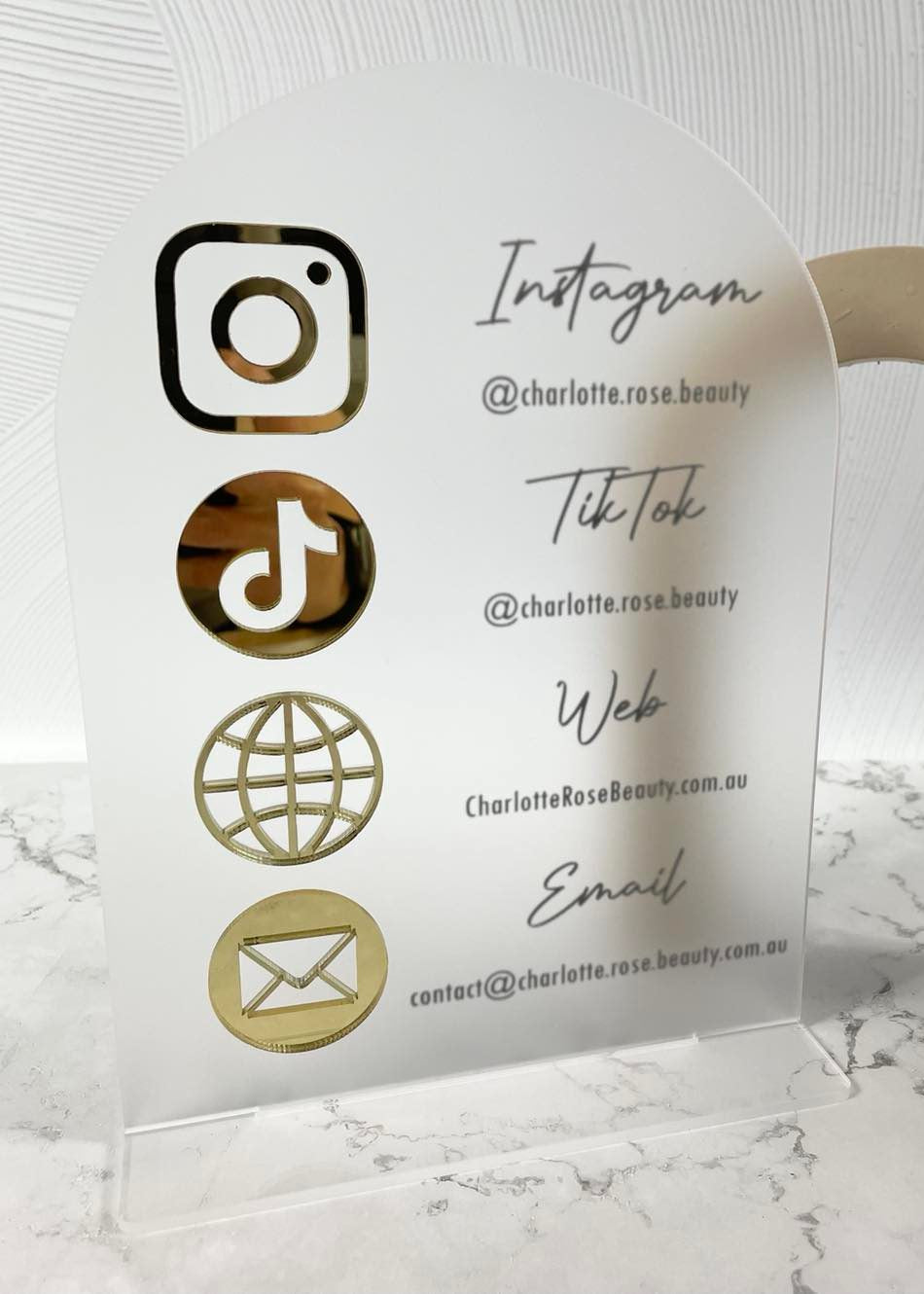 Custom neutral acrylic business sign with social icons for beauty salon