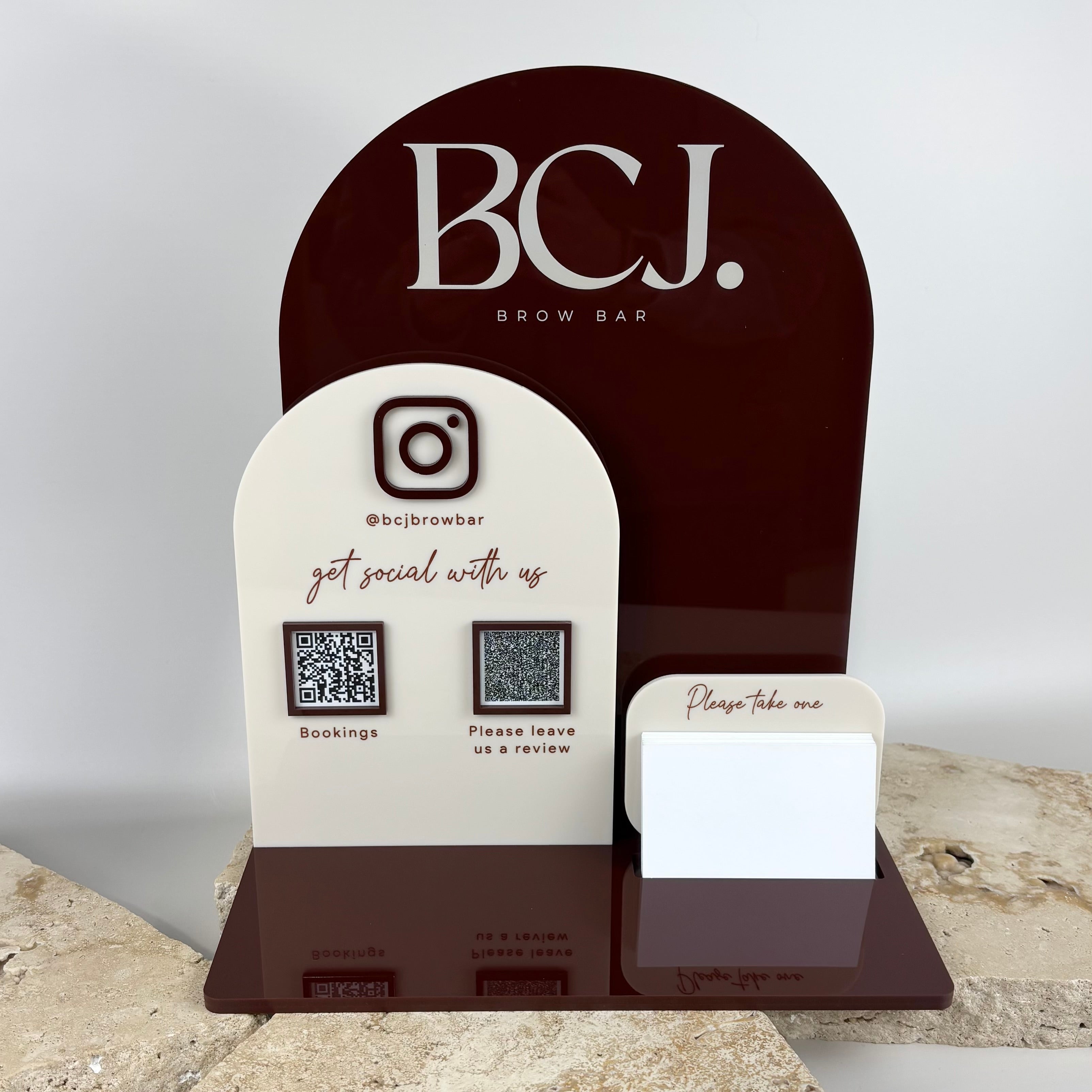 Custom acrylic business station with QR codes and card holder, personalised counter display for bookings, reviews, and social media connections.