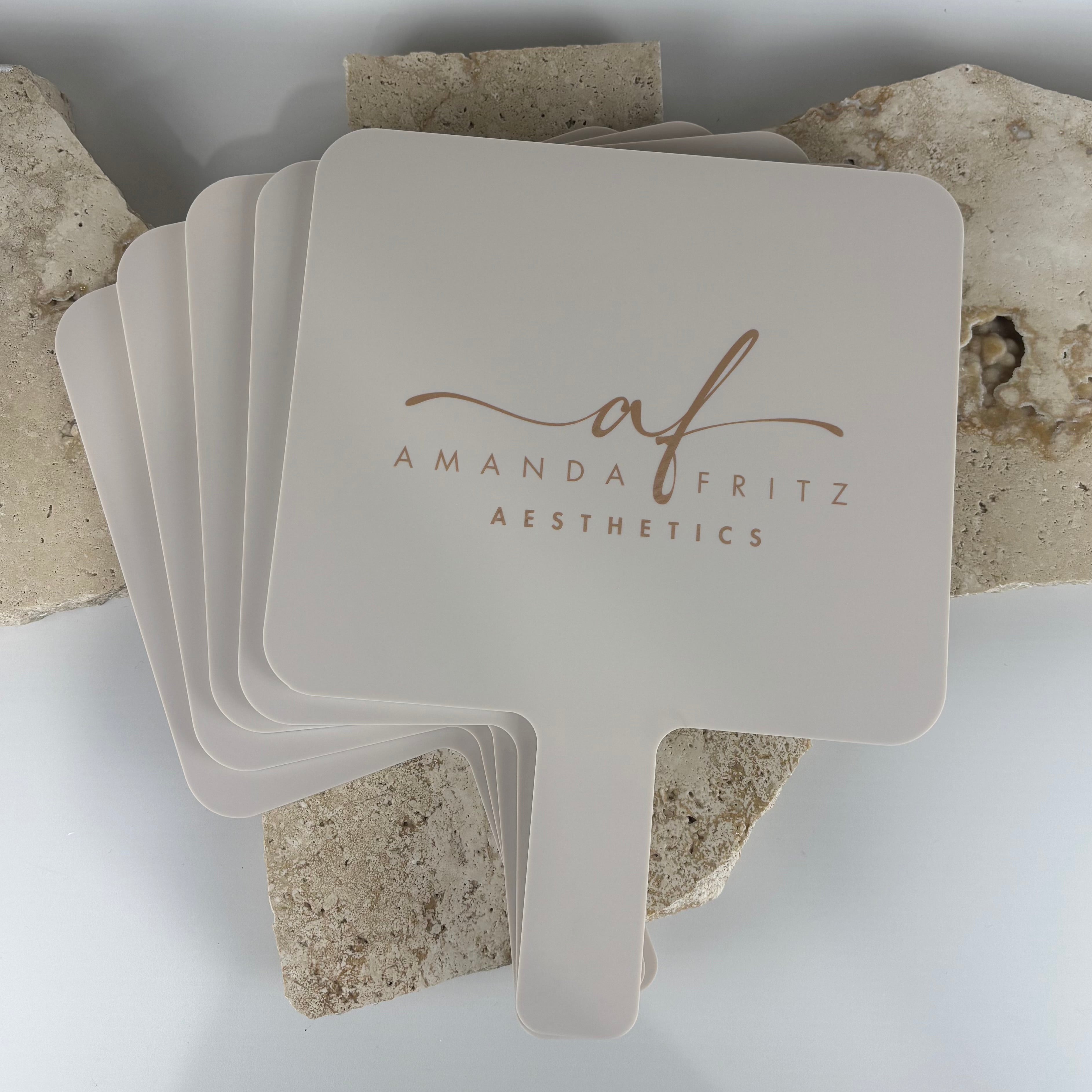 	Custom large handheld acrylic mirror with printed logo for beauty salon branding