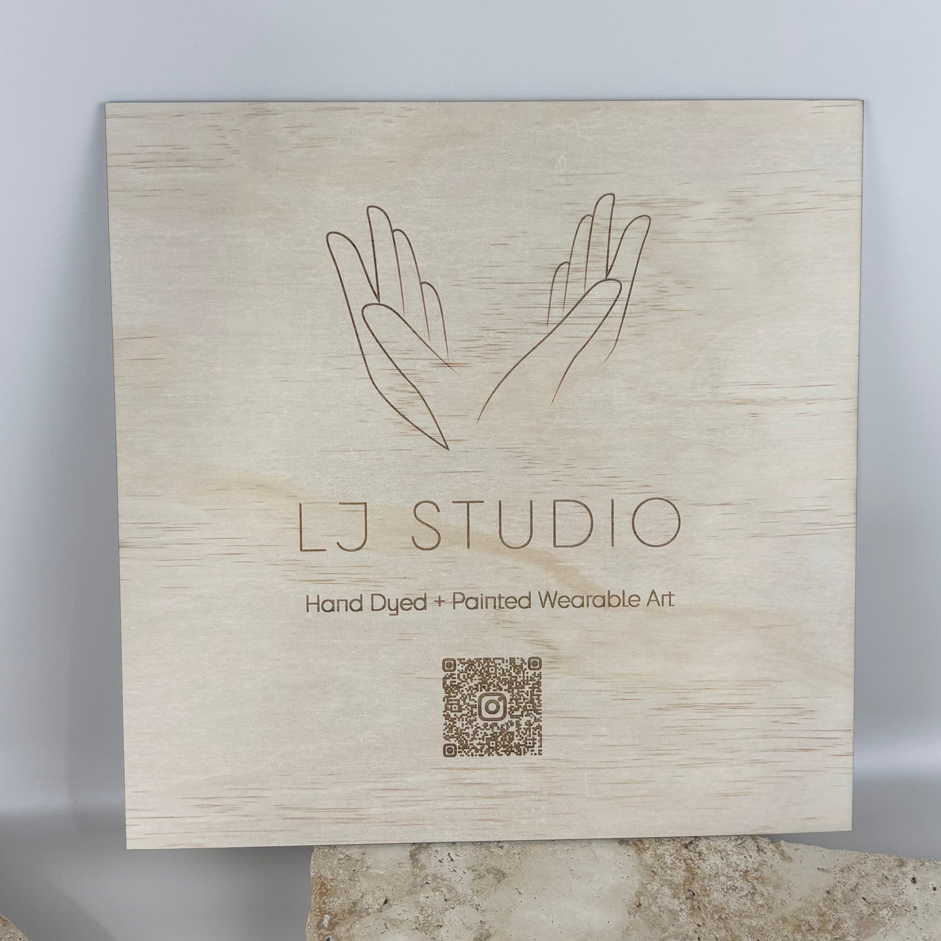 Laser engraved timber business sign with custom logo and branding for retail stores