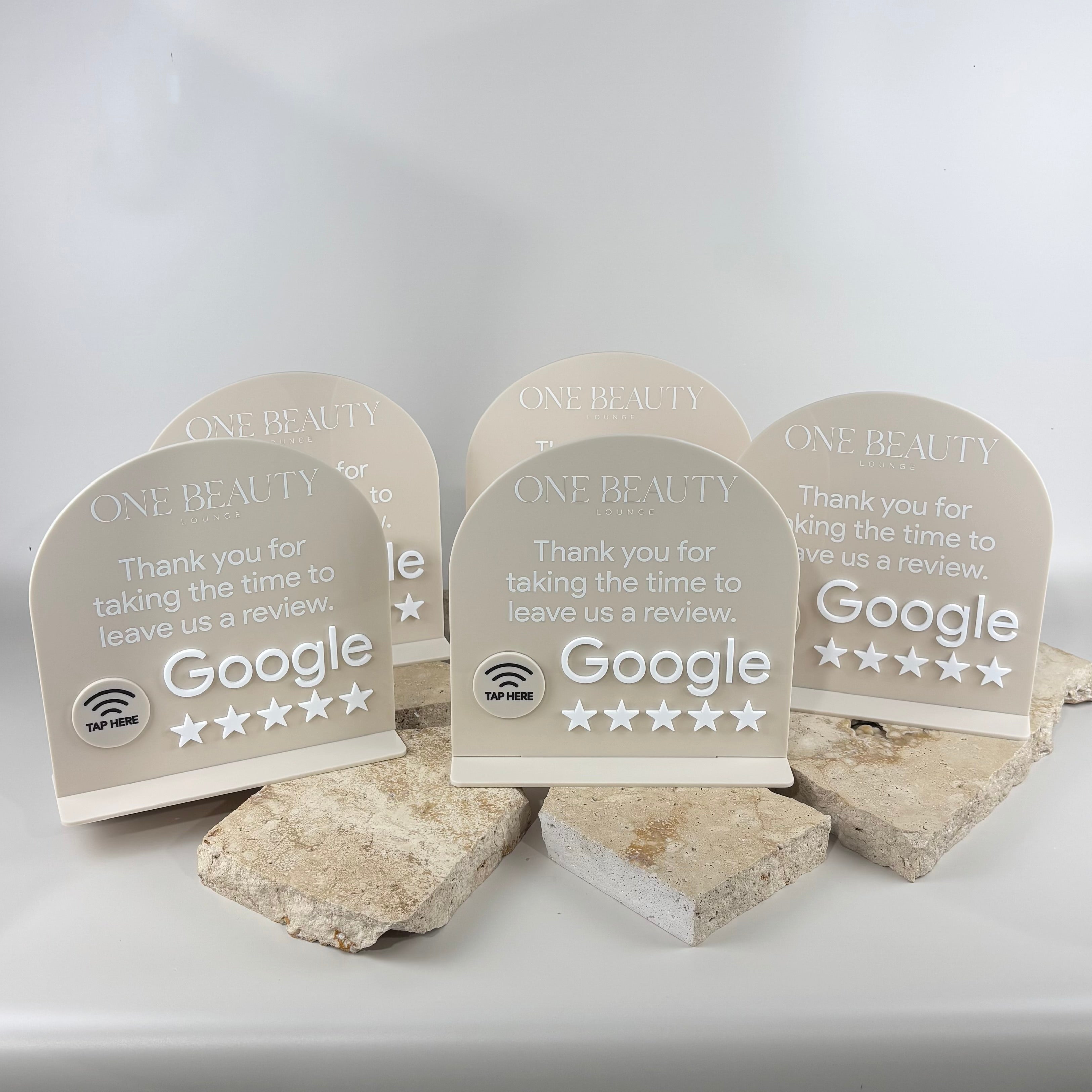 Custom NFC Google review stands for beauty salons, hair salons, lash technicians and small businesses. Acrylic countertop review displays featuring contactless tap technology, raised 3D lettering and Google review prompts designed to increase customer reviews and online visibility.
