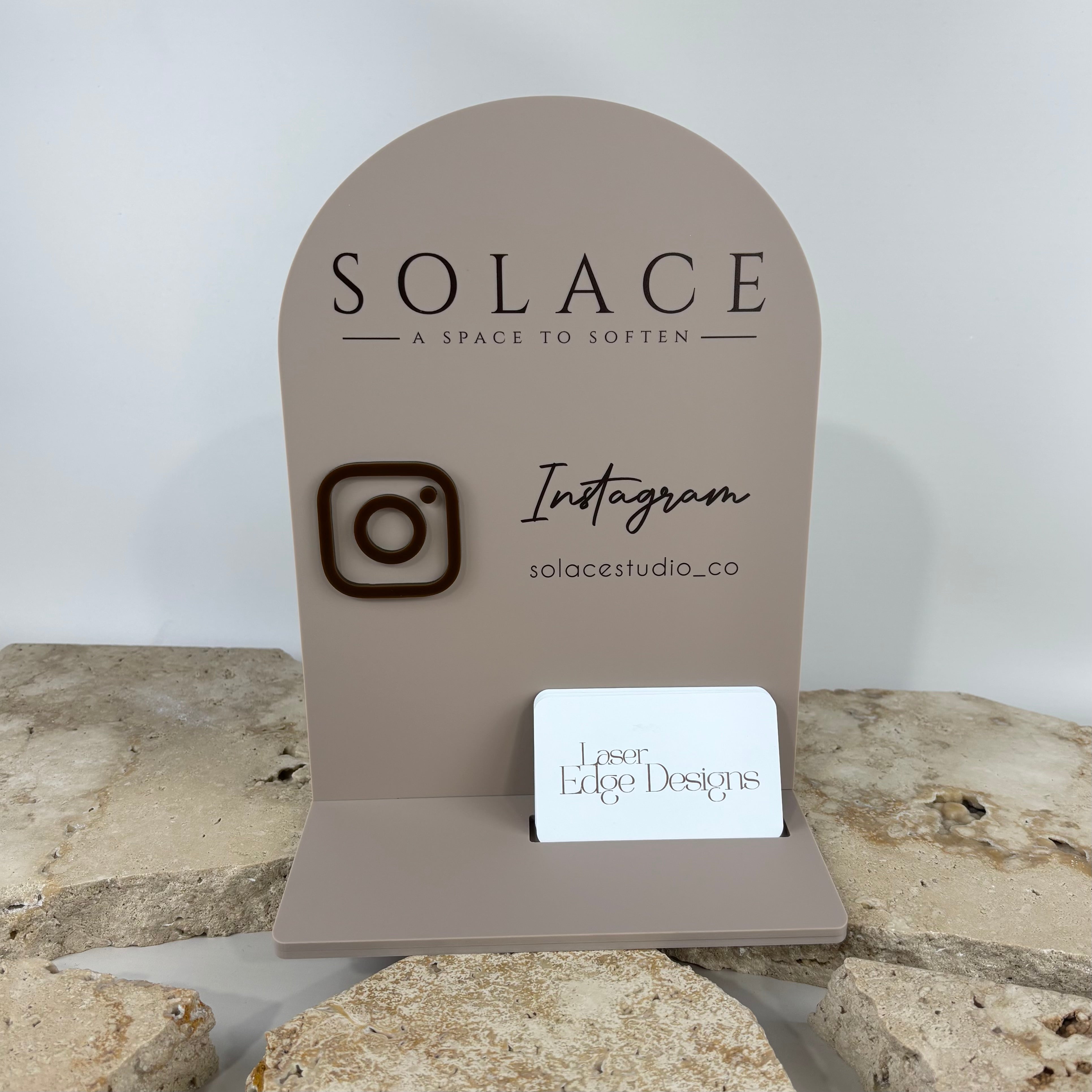 Modern acrylic Instagram business stand with custom branding, 3D Instagram logo and business card holder in neutral beige tones, UV printed social media display sign for salons, beauty studios and small businesses in Australia