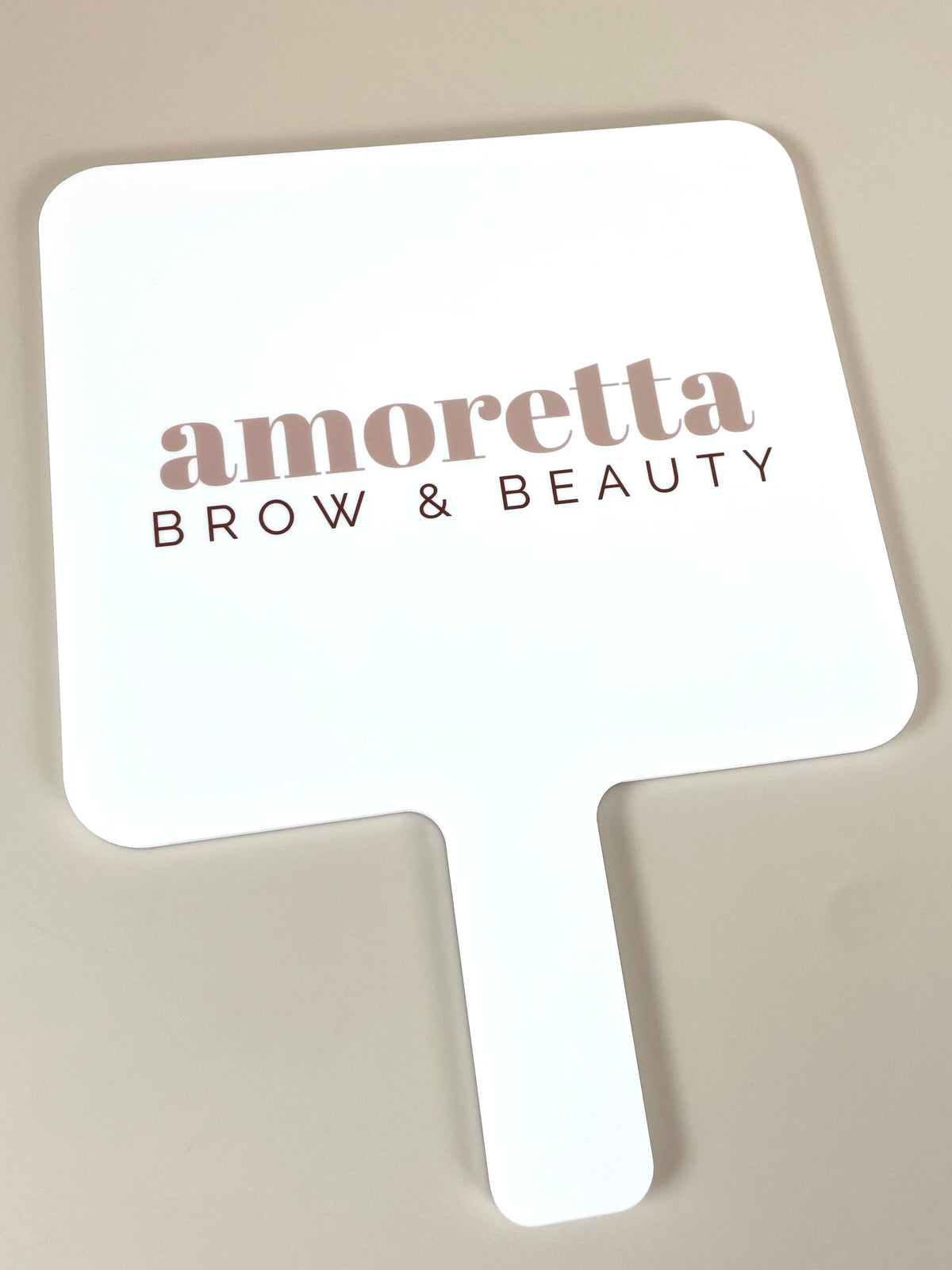 Large branded handheld mirror 