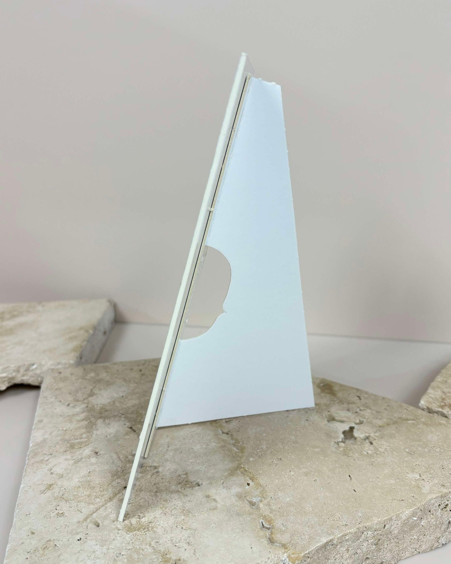 Side view of screen board tabletop sign with built-in support stand