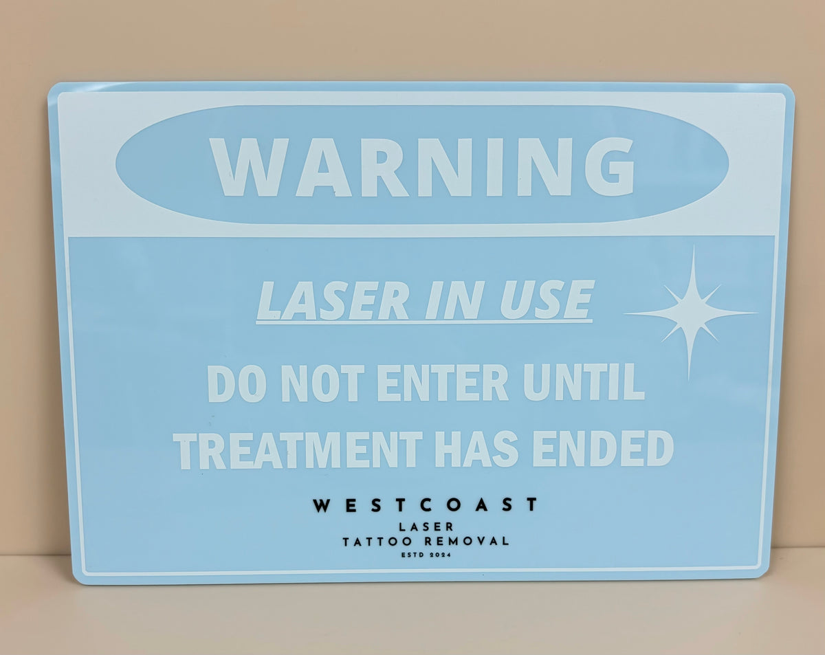 Warning laser in use sign 