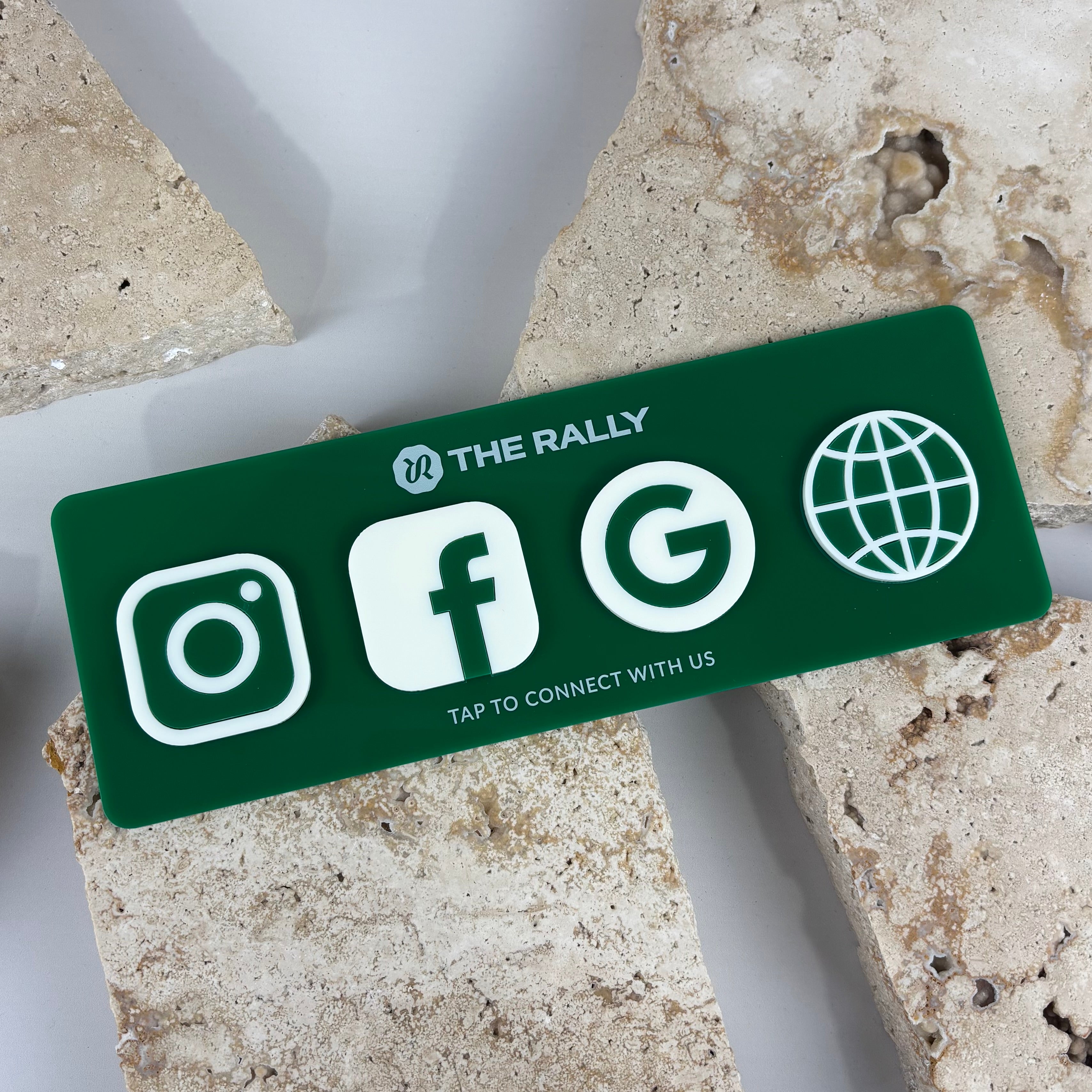 Custom green NFC business station with Instagram, Facebook, Google and website icons. Acrylic social media display stand for businesses, contactless NFC marketing sign, Google review stand and branded countertop customer engagement display.