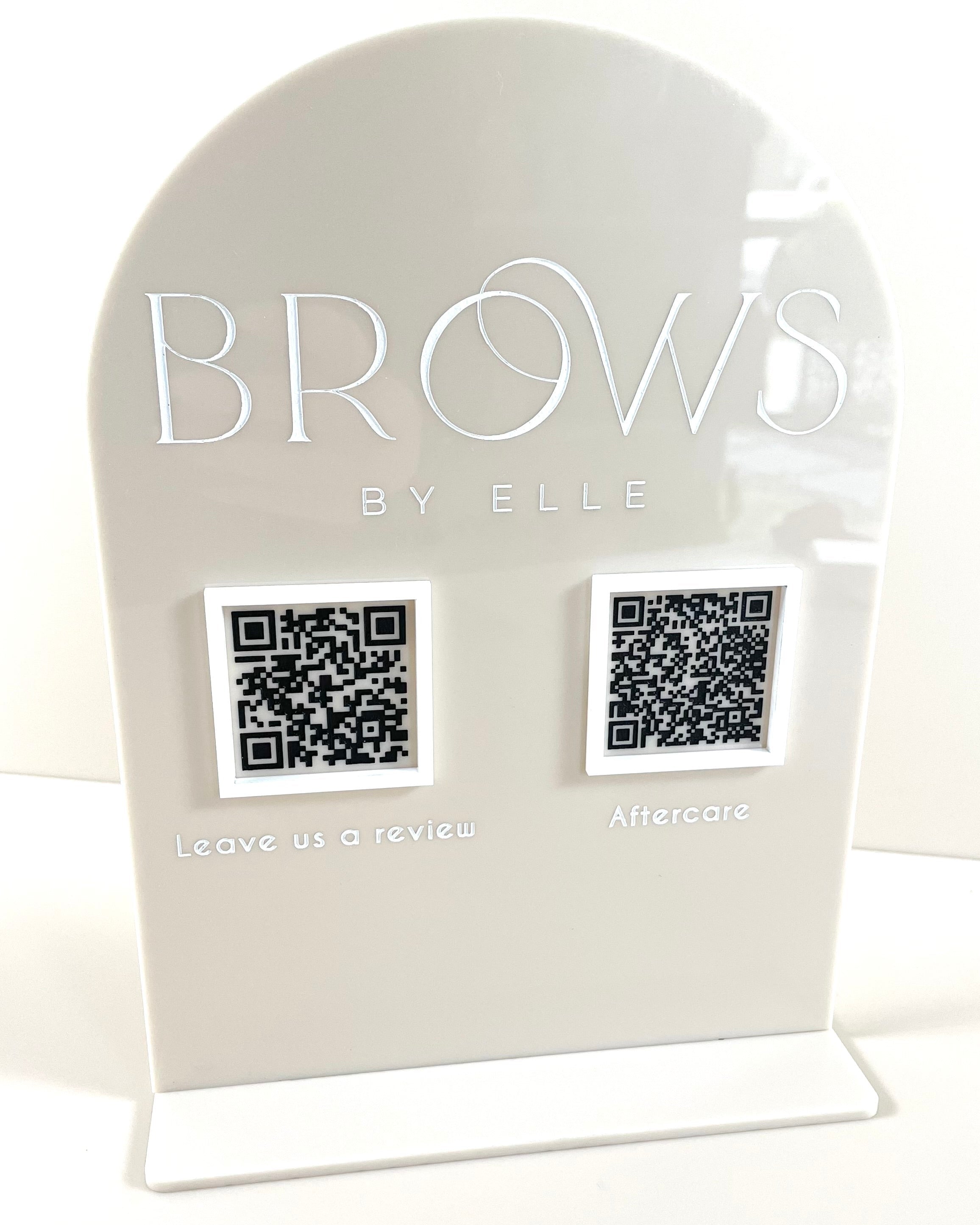 Minimalist white acrylic QR code display stand for brow studio or salon