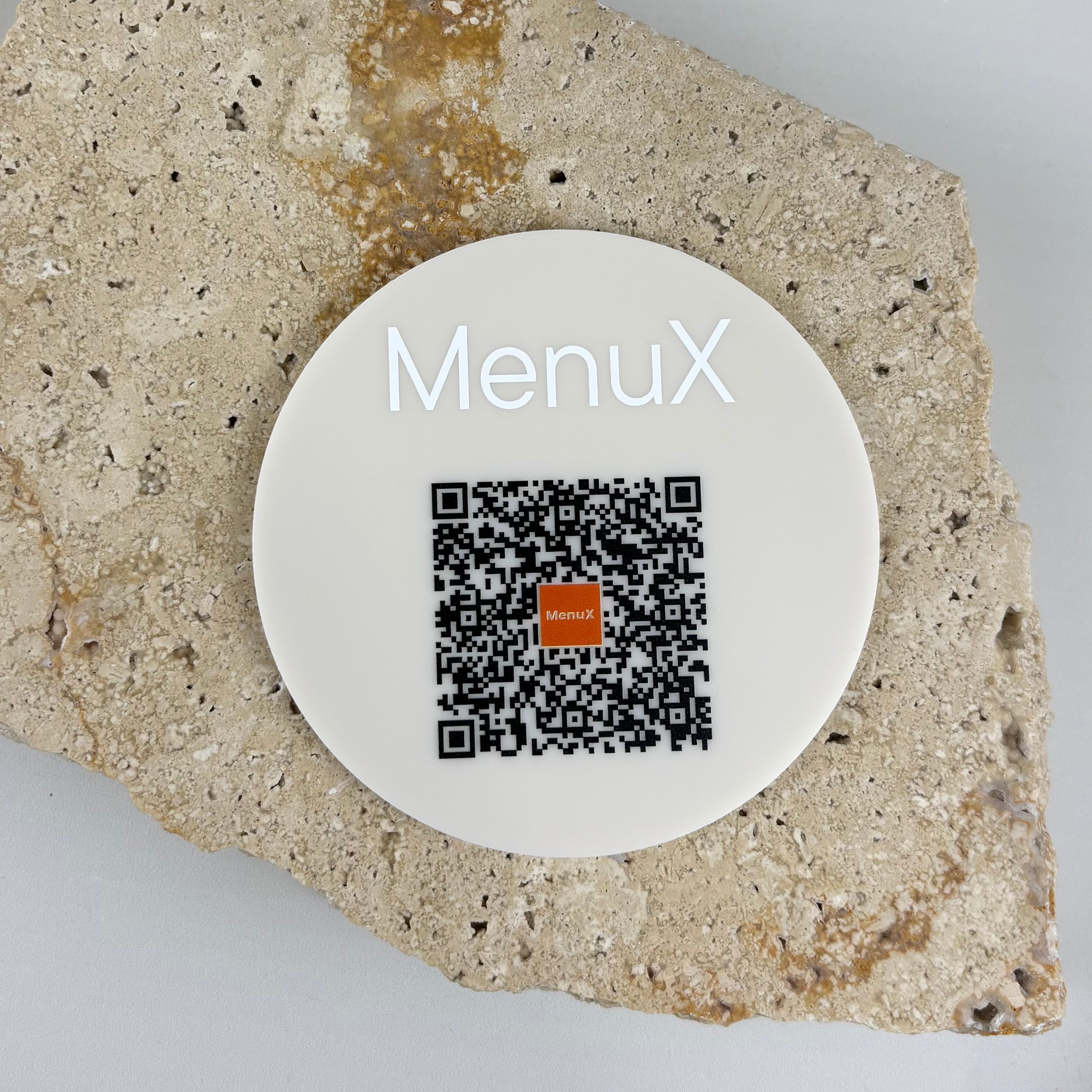 Custom round white acrylic QR code sign with MenuX branding, designed for contactless digital menu access in restaurants and hospitality venues.