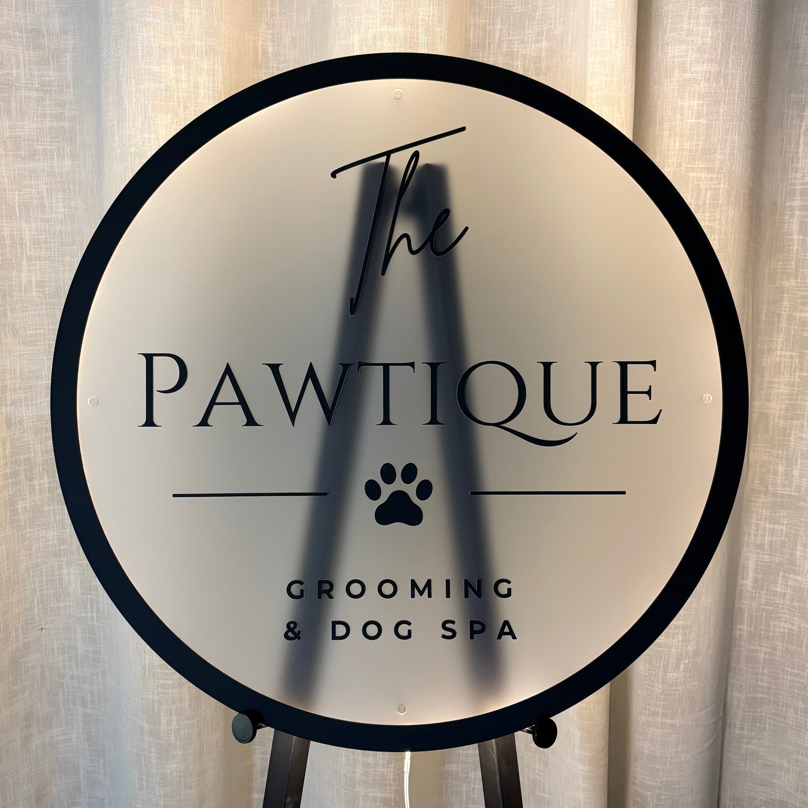 Custom round acrylic business sign with raised 3D lettering, premium wall logo sign for dog grooming salons, pet spas, veterinary clinics, retail stores and professional business branding.