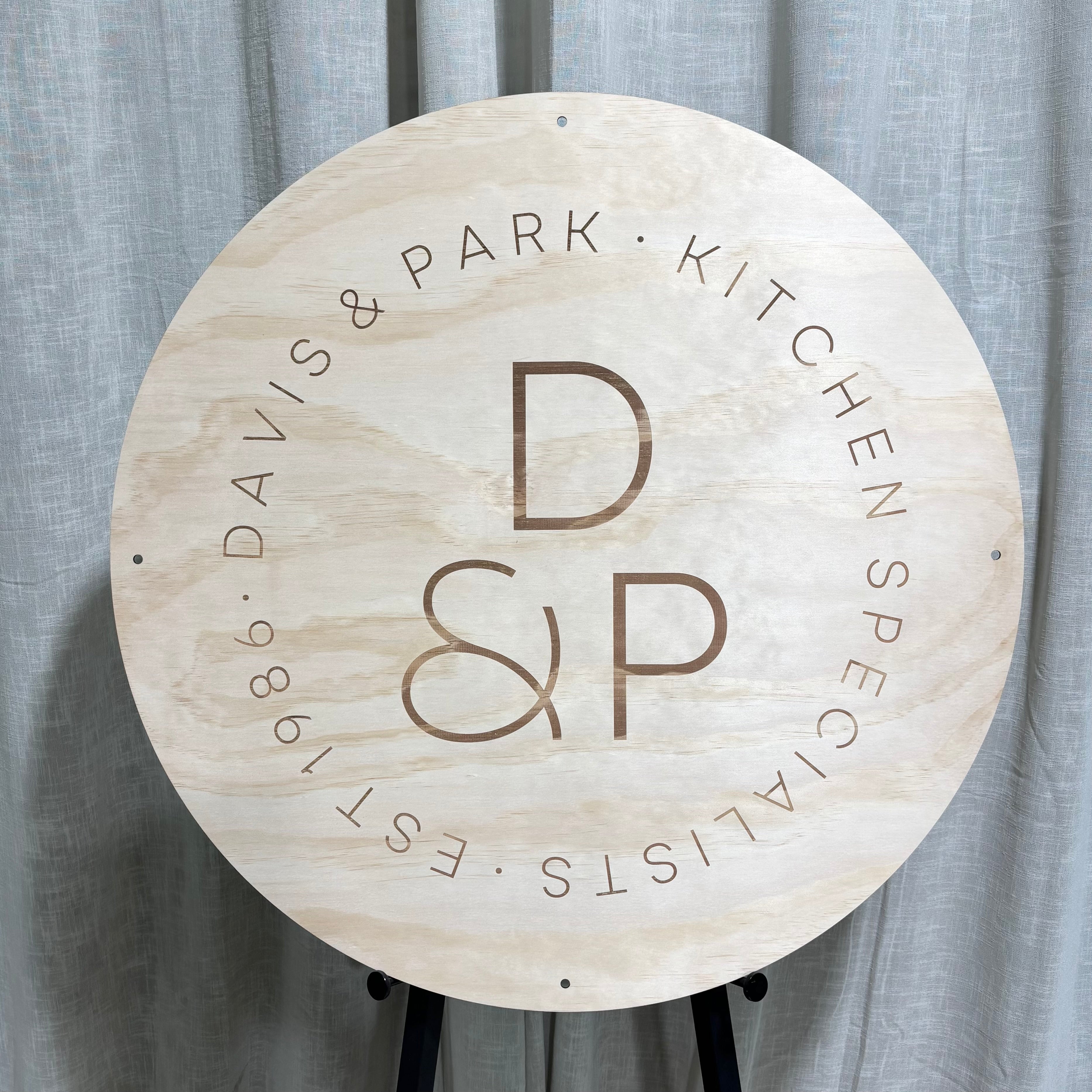 Custom engraved timber business sign with logo for storefront branding and business signage