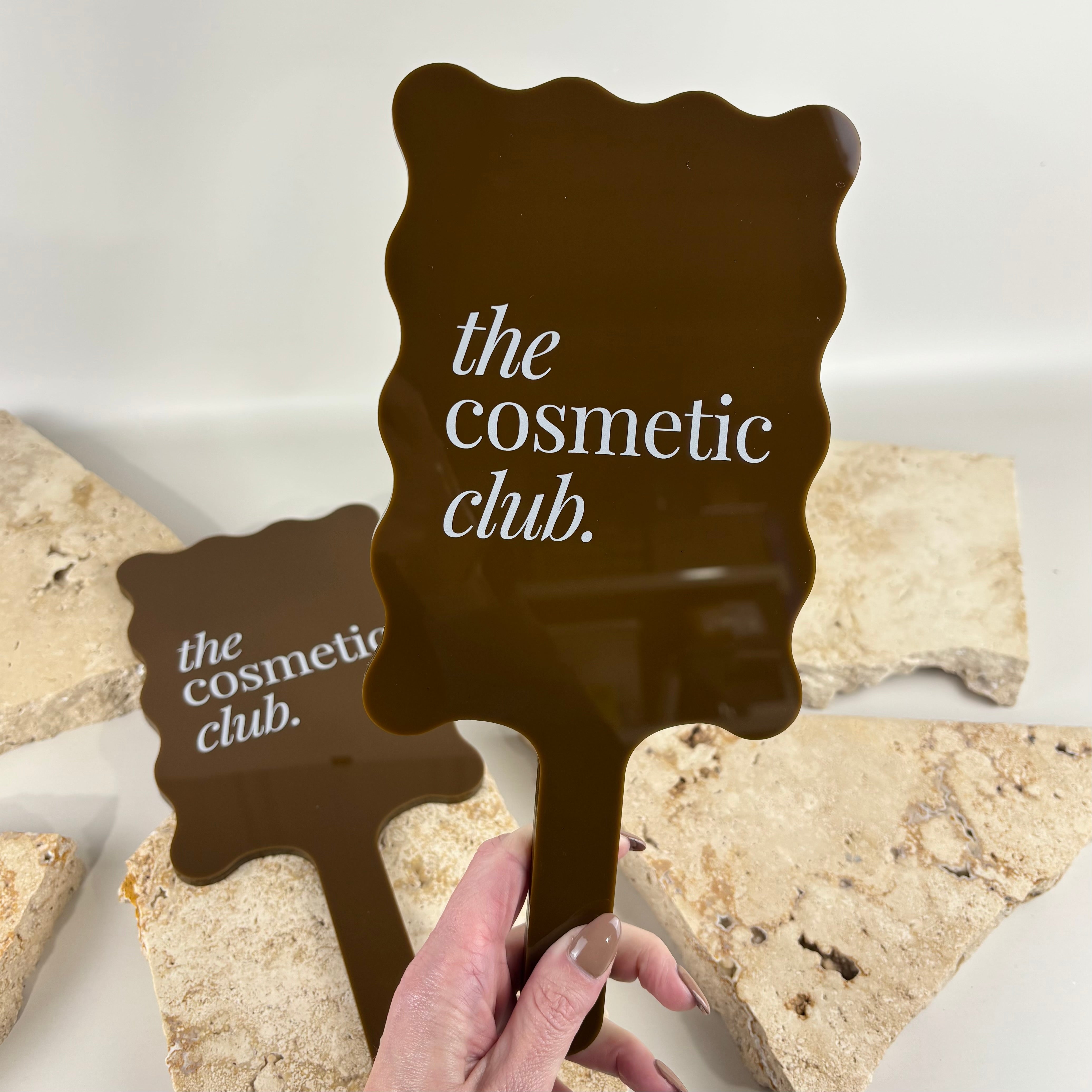 Luxury branded handheld mirror for beauty salon and cosmetic clinic with custom logo, wavy acrylic handheld mirror for lash technicians, makeup artists, hairdressers and aesthetic businesses in Australia and New Zealand