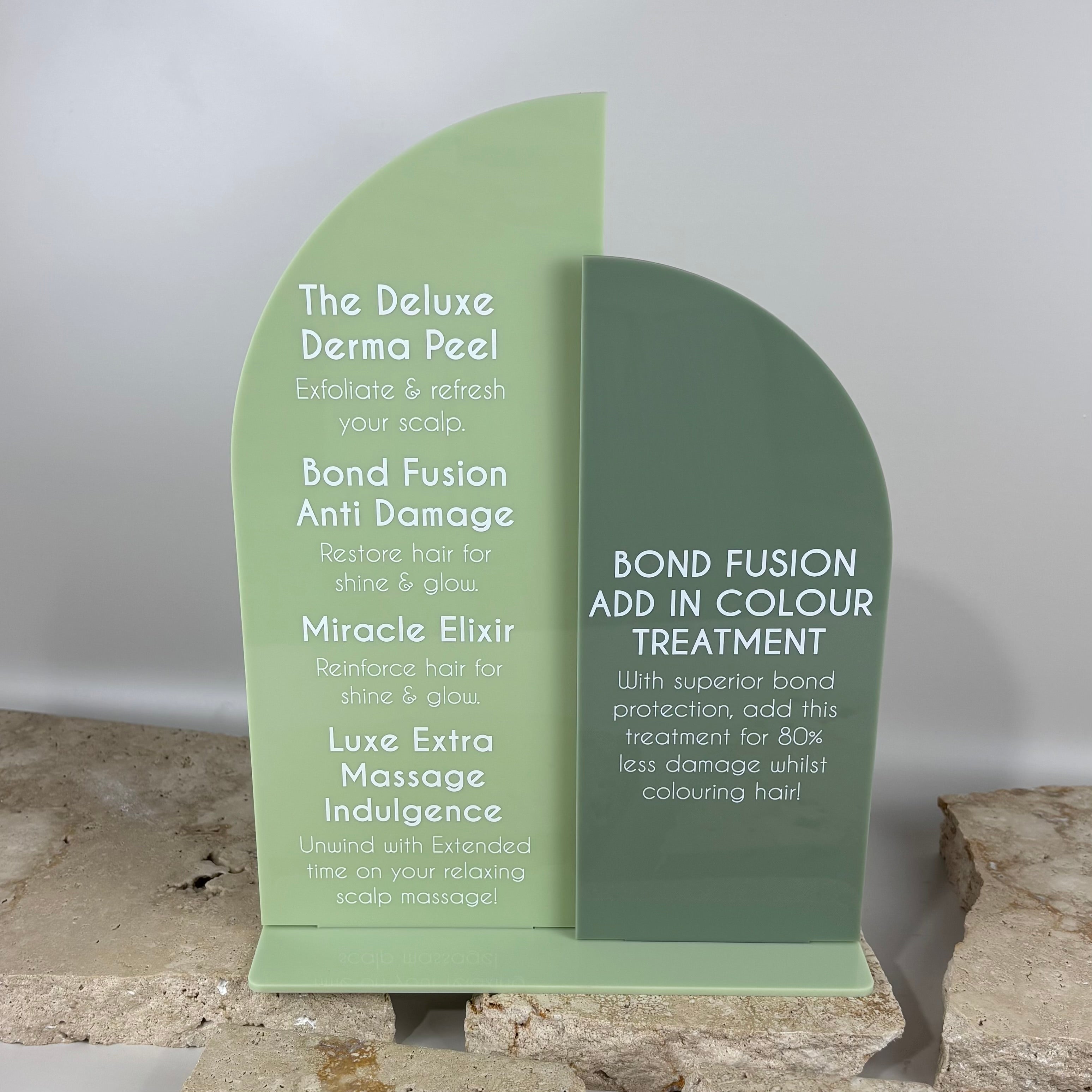 Custom sage green acrylic salon treatment menu sign featuring add-on services including derma peel, bond fusion, miracle elixir and scalp massage, modern layered arch design for hair and beauty salons