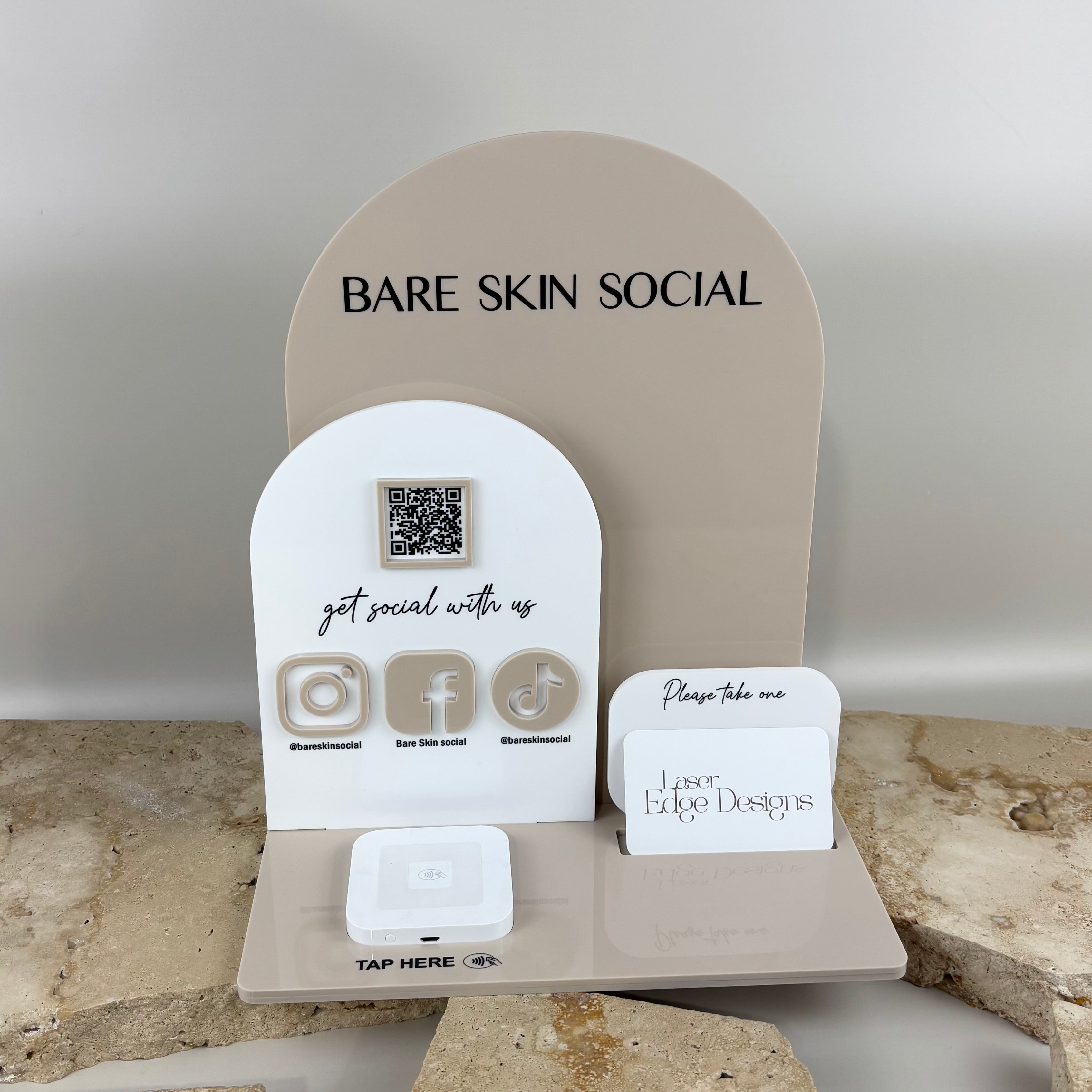 Custom NFC business station with QR code, social media icons, business card holder and contactless tap point, featuring premium UV printed acrylic branding for Bare Skin Social, ideal for beauty salons, cosmetic clinics, barbers, cafés, retail stores and small businesses.