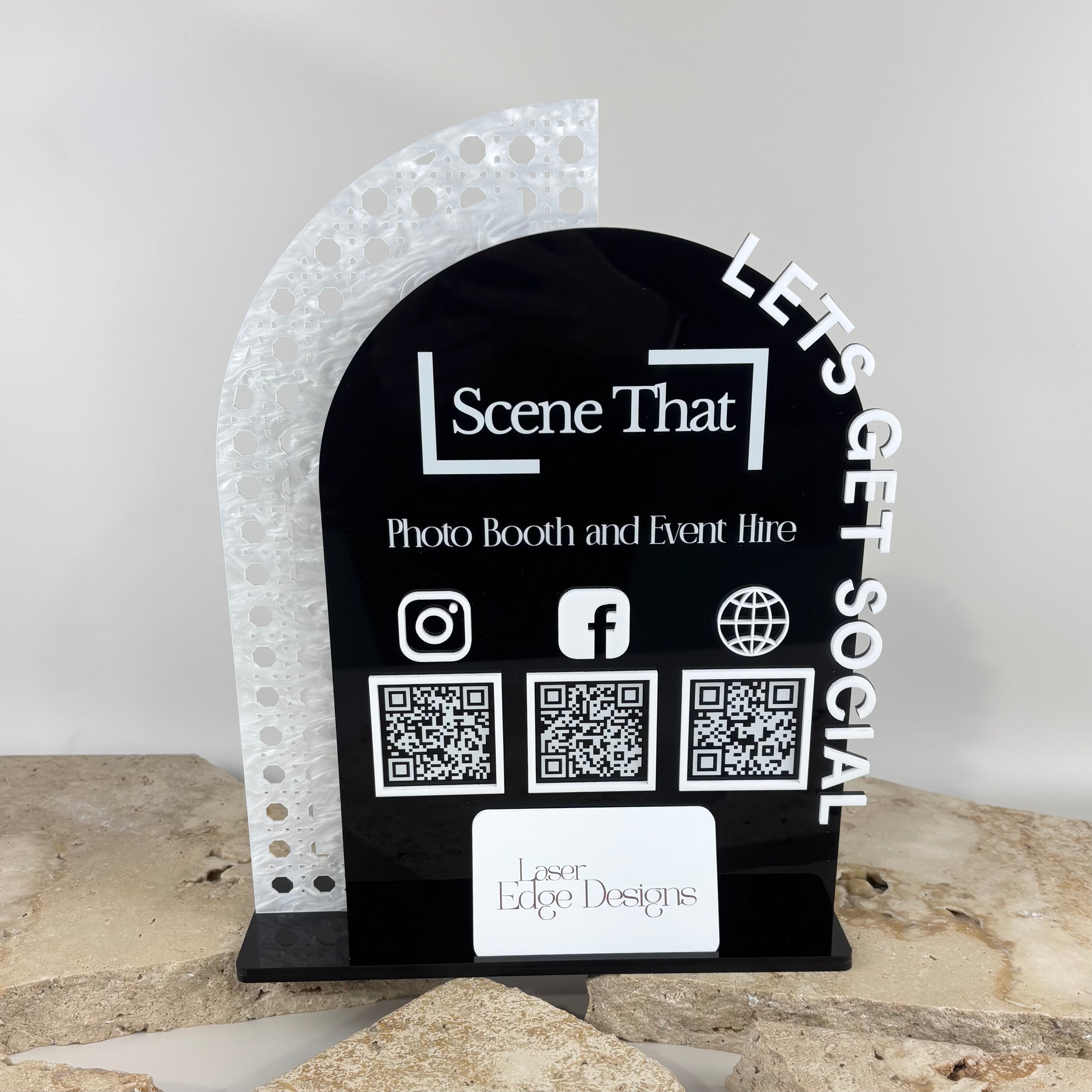 Modern acrylic arch social media stand with QR codes, business card holder and raised 3D lettering for salon and small business counters
