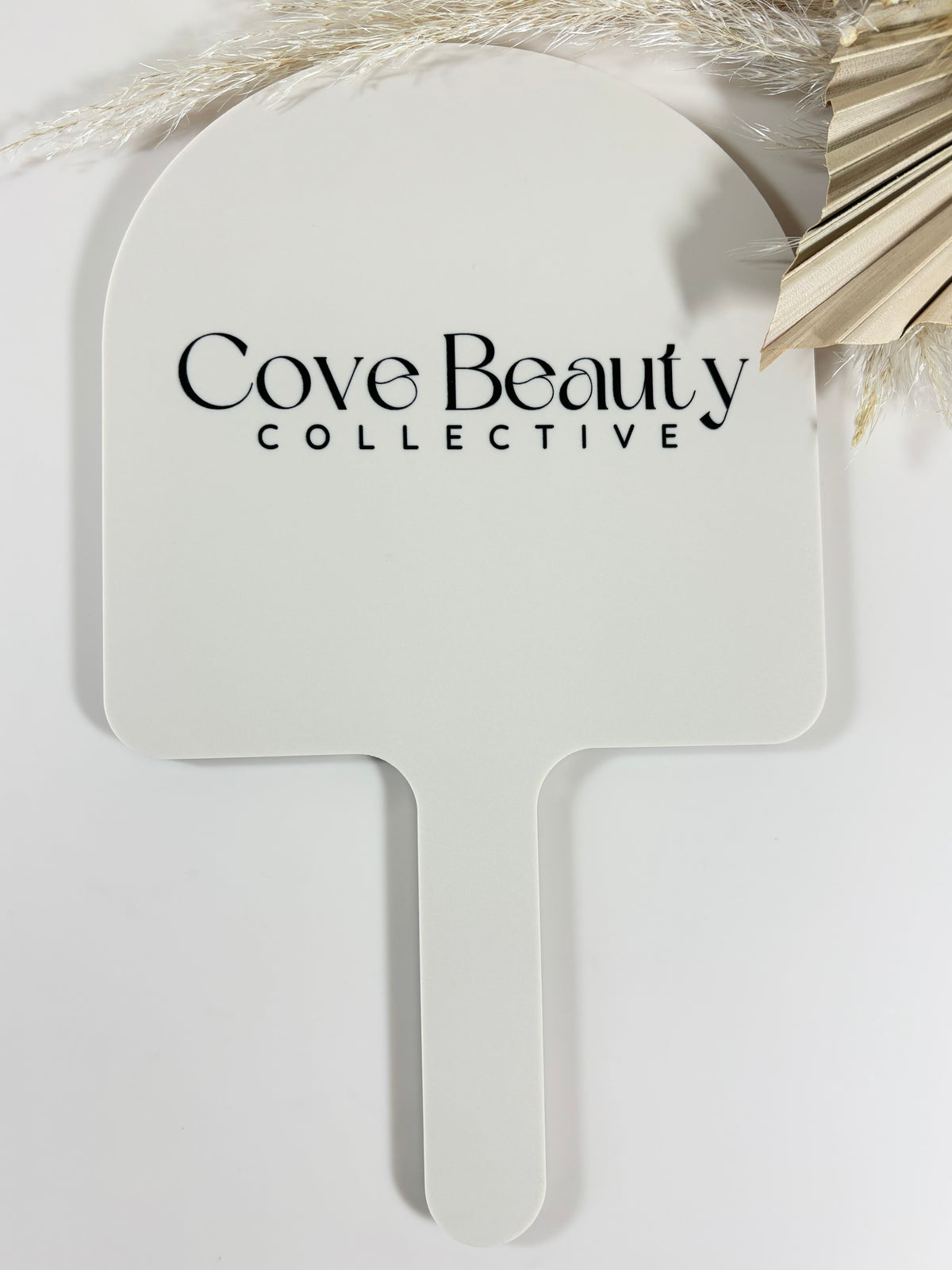 Custom arched handheld mirror 