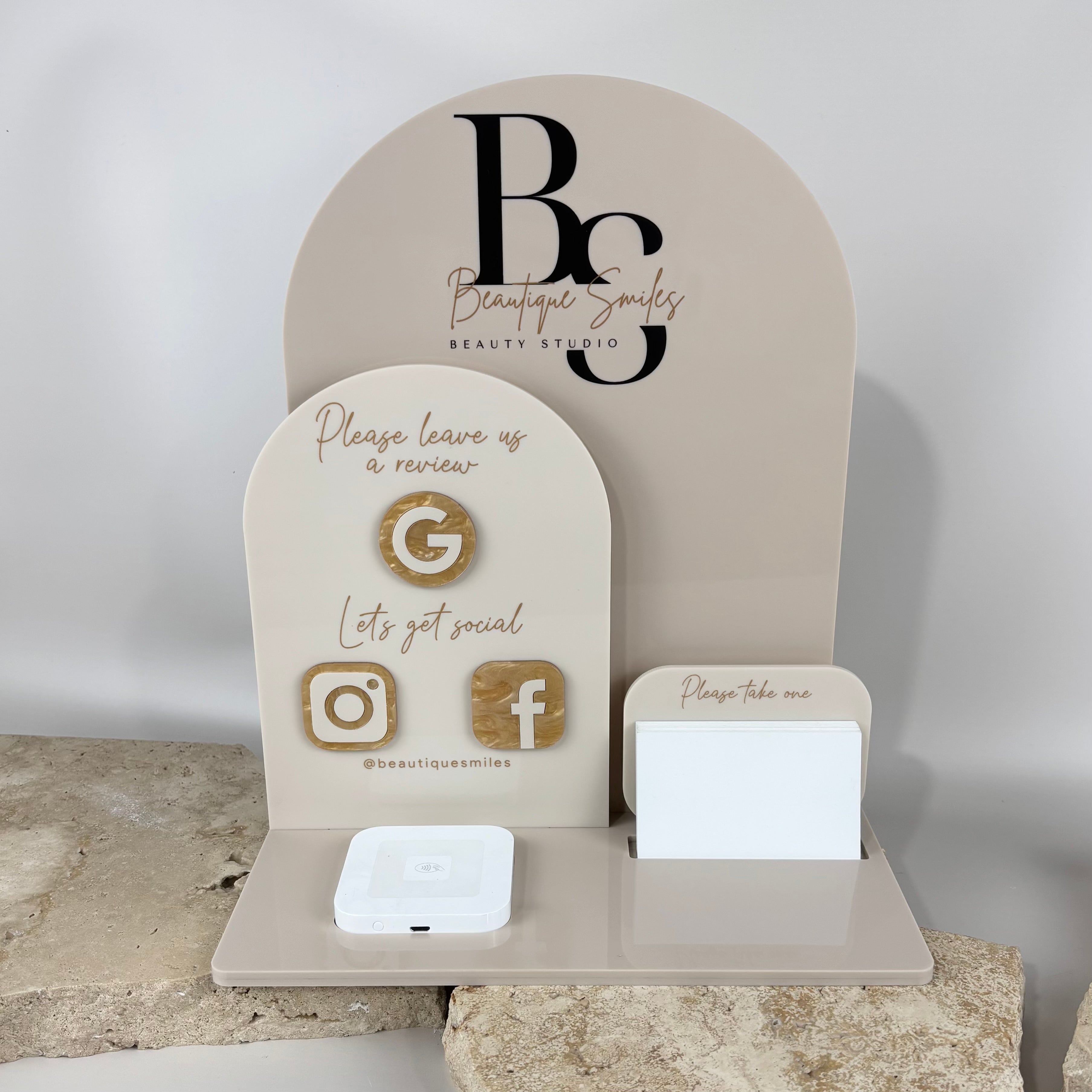 Custom beige acrylic business station with Google review sign, Instagram and Facebook icons, card holder and NFC tap for beauty studio branding