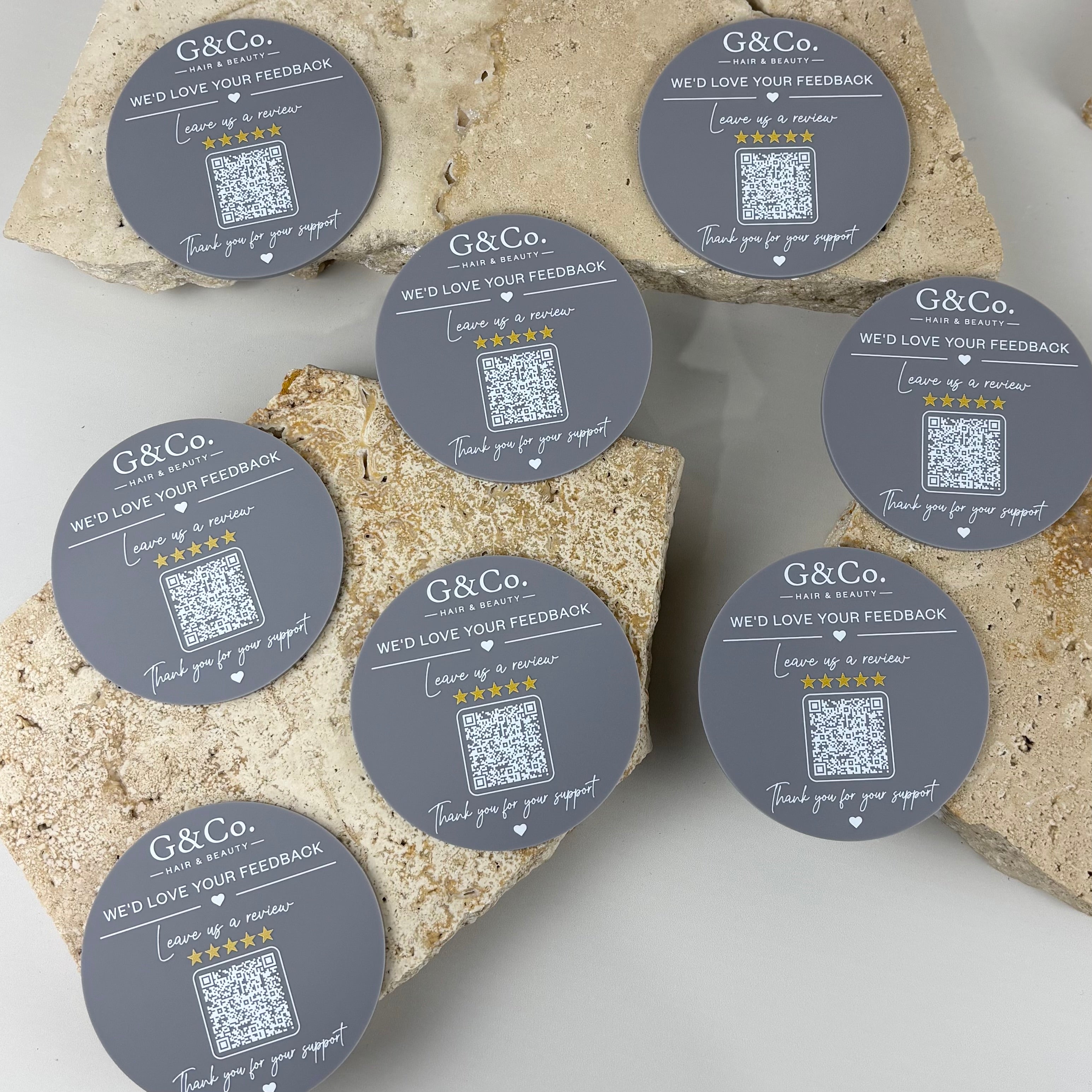 Custom Google review QR code discs with business logo, personalised acrylic scan to review signs for salon counters, tables, beauty clinics and small businesses.