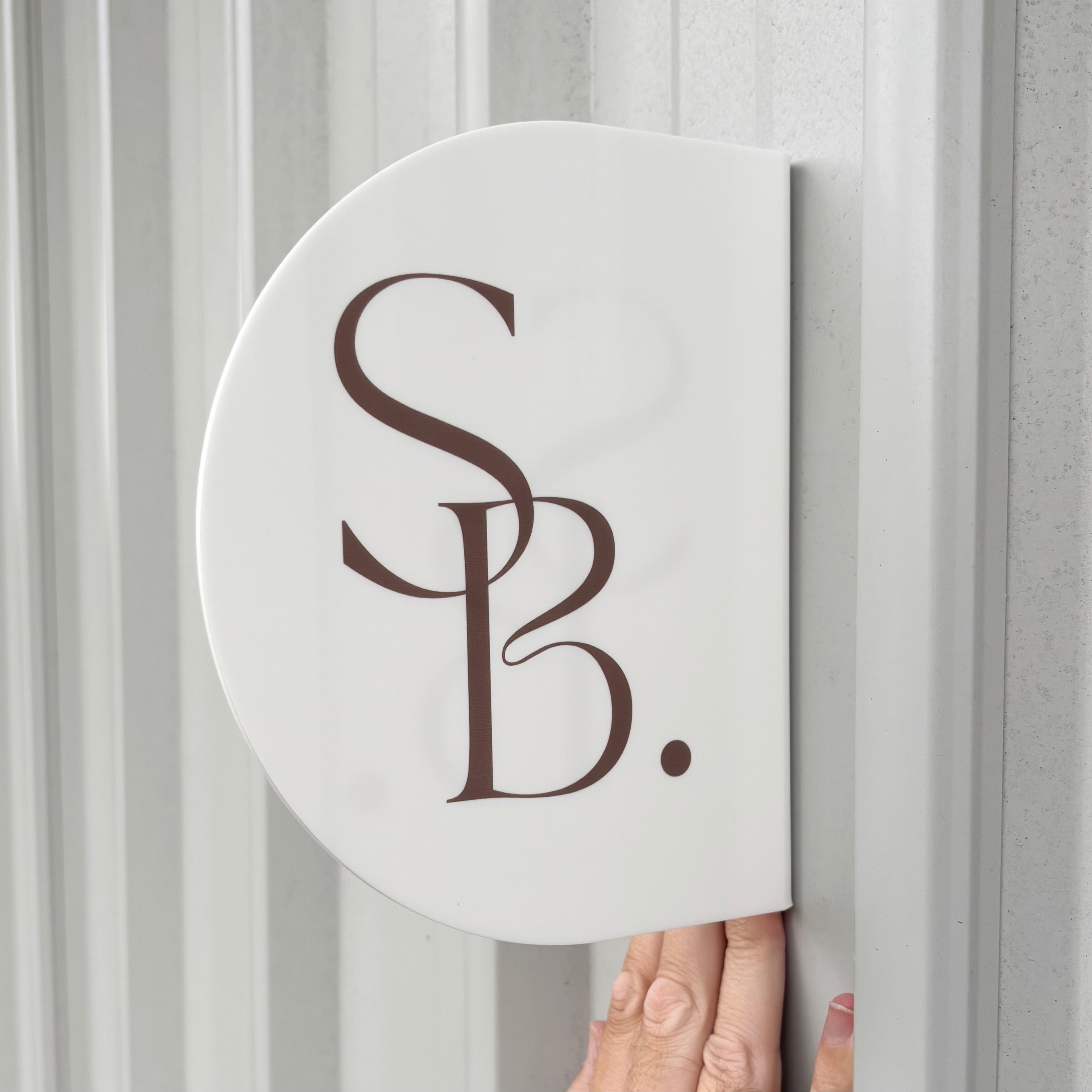 Modern half-round acrylic business sign featuring custom logo branding and UV printed design. Minimalist wall-mounted salon signage for beauty businesses, cosmetic clinics, hair salons and professional studio entrances.