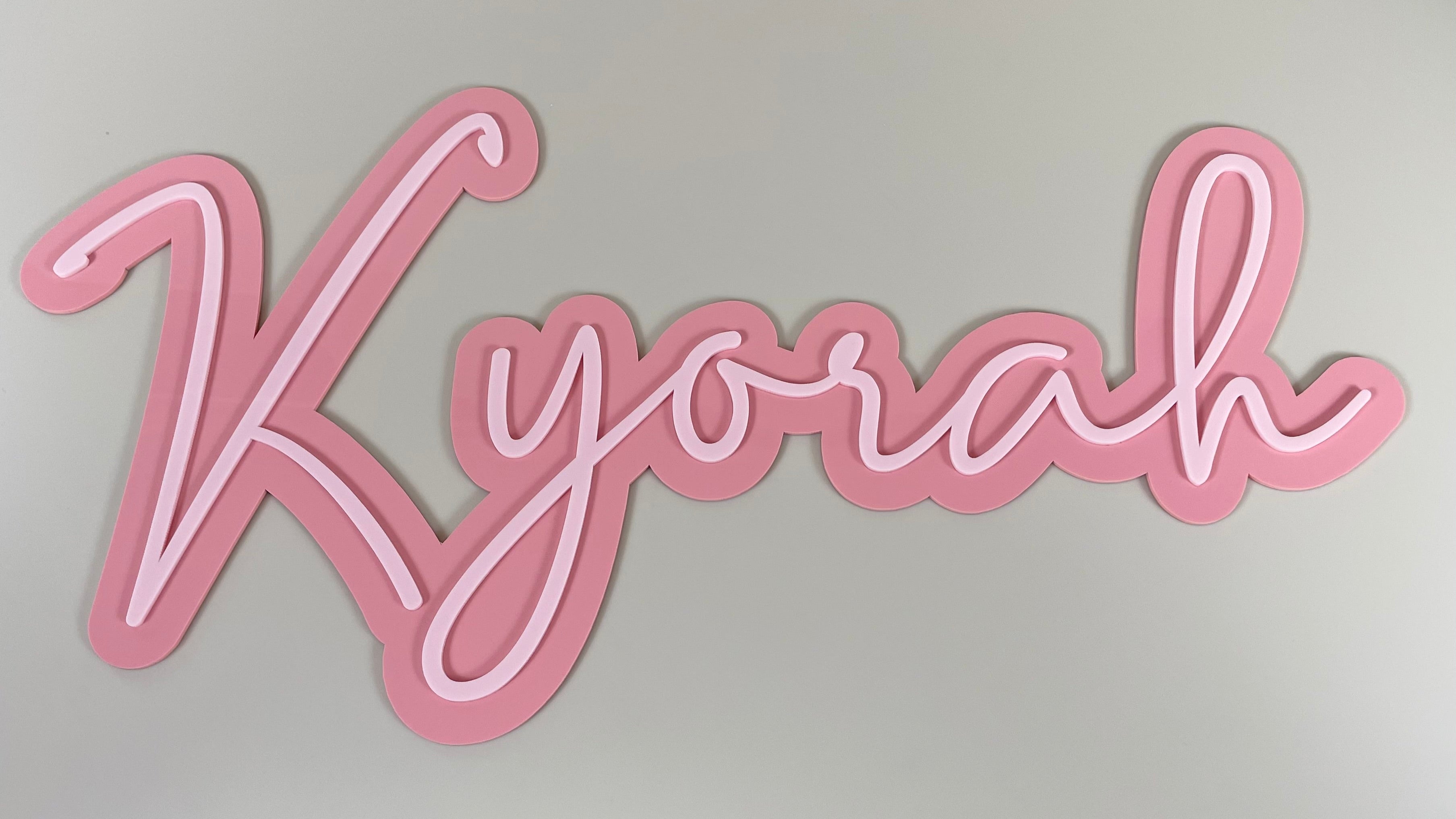 Layered name plaque 