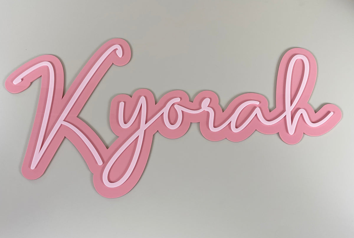 Layered name plaque 