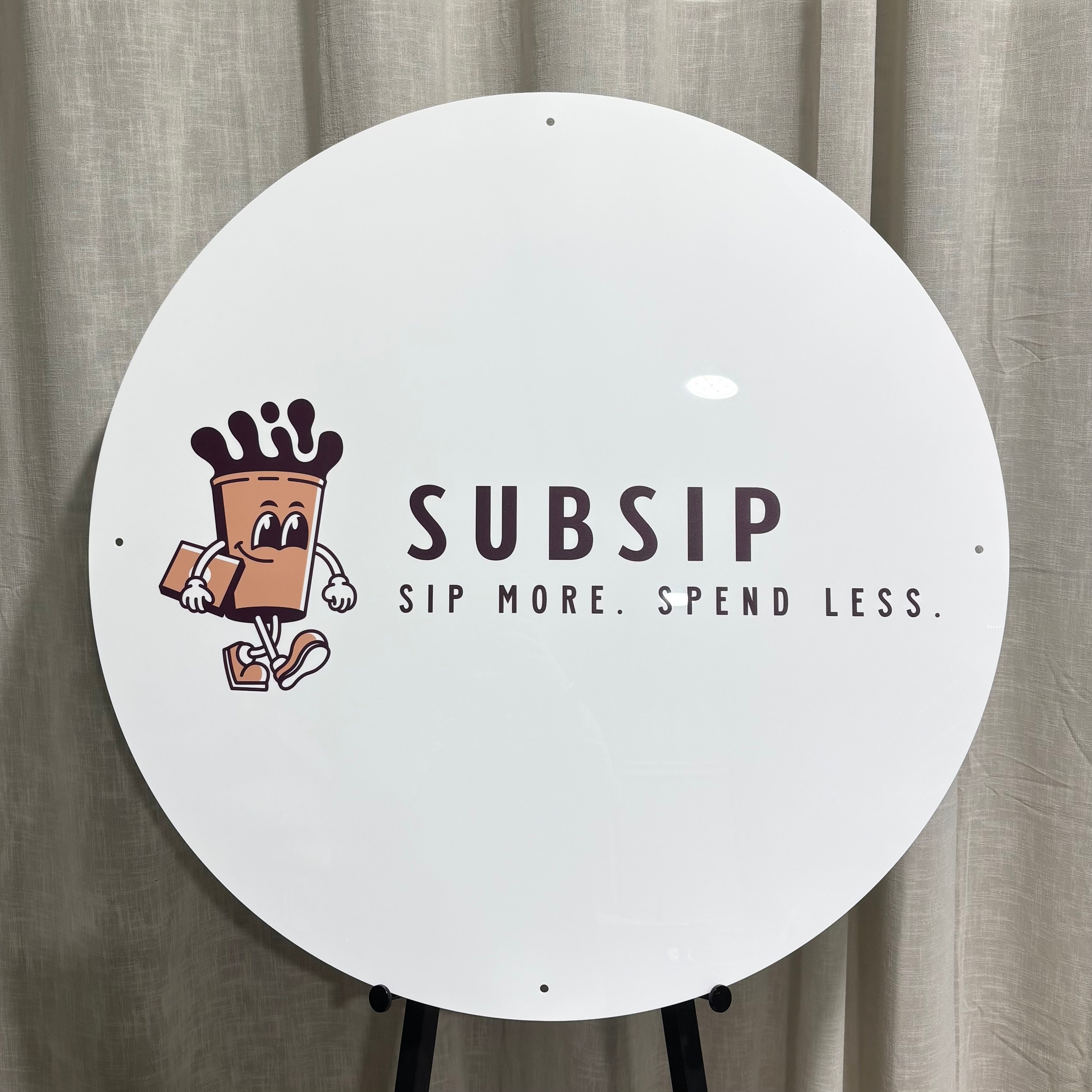 Custom UV printed round acrylic business sign with full-colour logo and branding. Professional promotional signage for cafés, beverage brands, subscription businesses and retail stores, featuring high-resolution UV printing on white acrylic for indoor or outdoor business display.