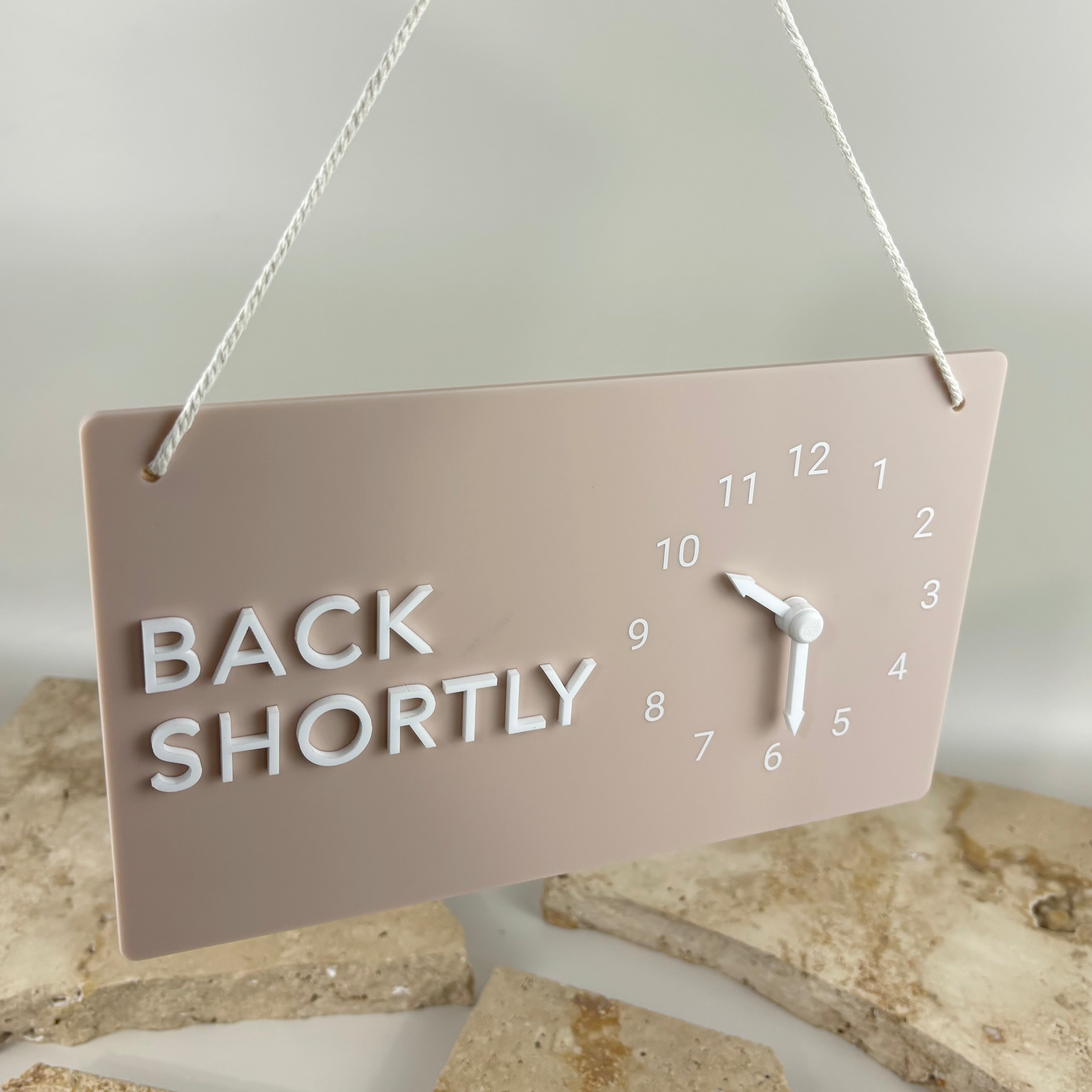 Acrylic Back Shortly hanging business sign with movable clock hands to display return time for salons, cafés, boutiques and retail stores.