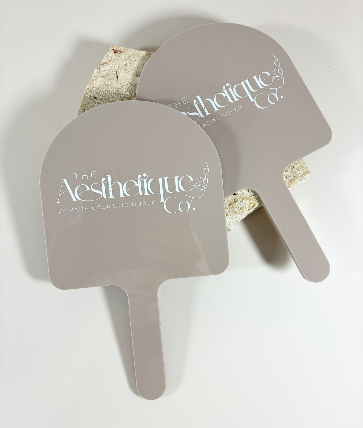 Arched handheld mirrors