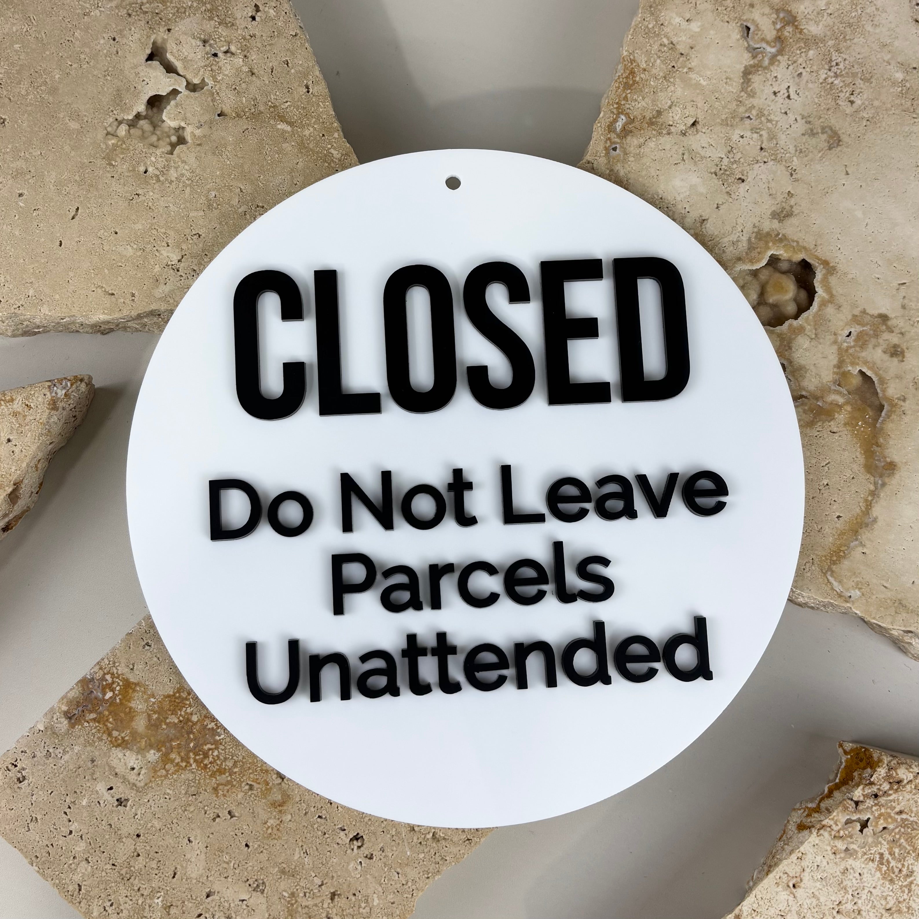     Modern round closed sign with layered acrylic lettering for storefront, clinic and salon entrance door