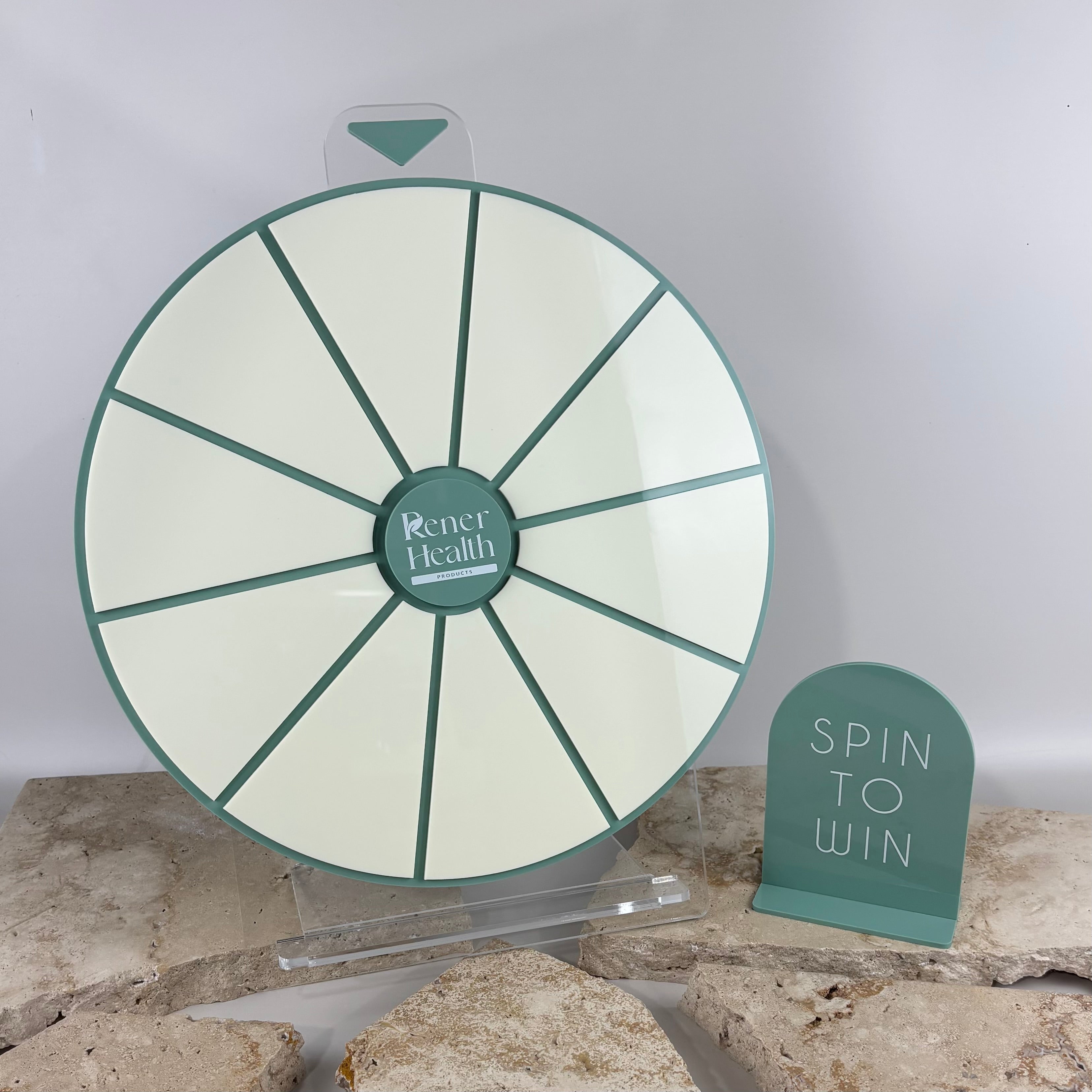 Custom branded spin to win wheel for small businesses, acrylic prize wheel for retail promotions and events, personalised competition spinner display for salons and studios, interactive marketing display stand for customer engagement