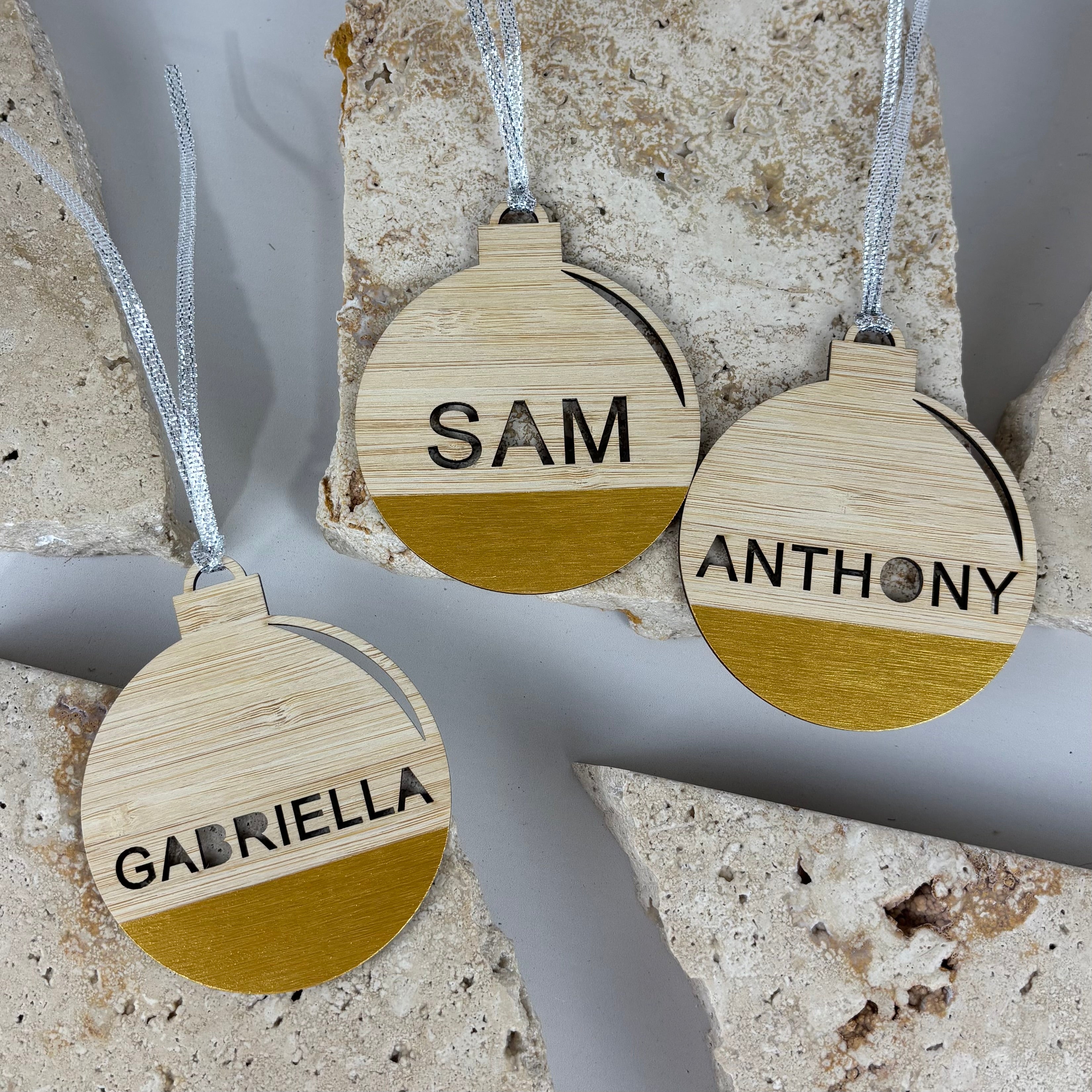 personalised wooden christmas baubles with names