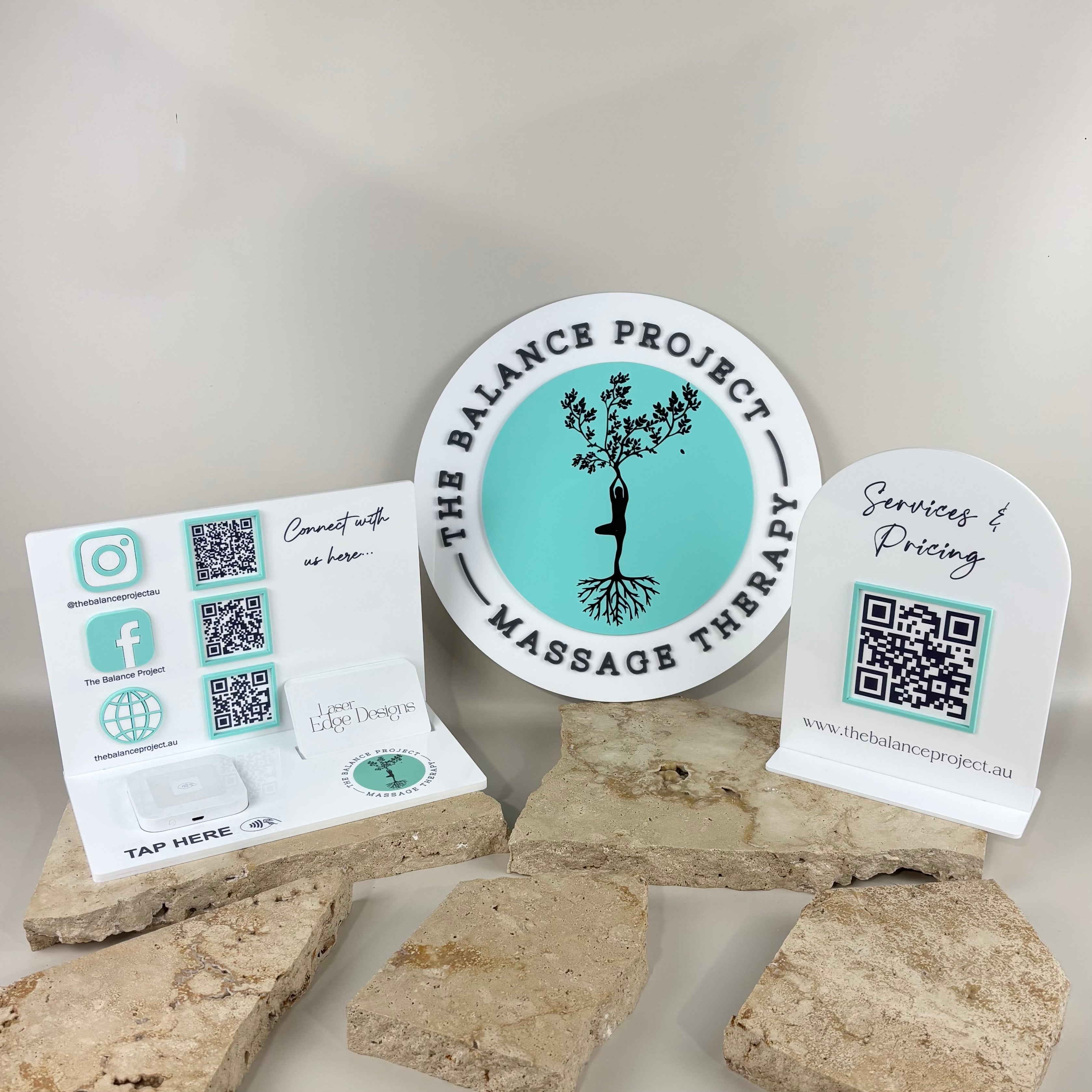 Custom acrylic business sign bundle for massage therapy clinic featuring round 3D logo wall sign, NFC tap card holder stand, social media QR code display and services pricing QR stand for salon and small business reception counters in Australia.