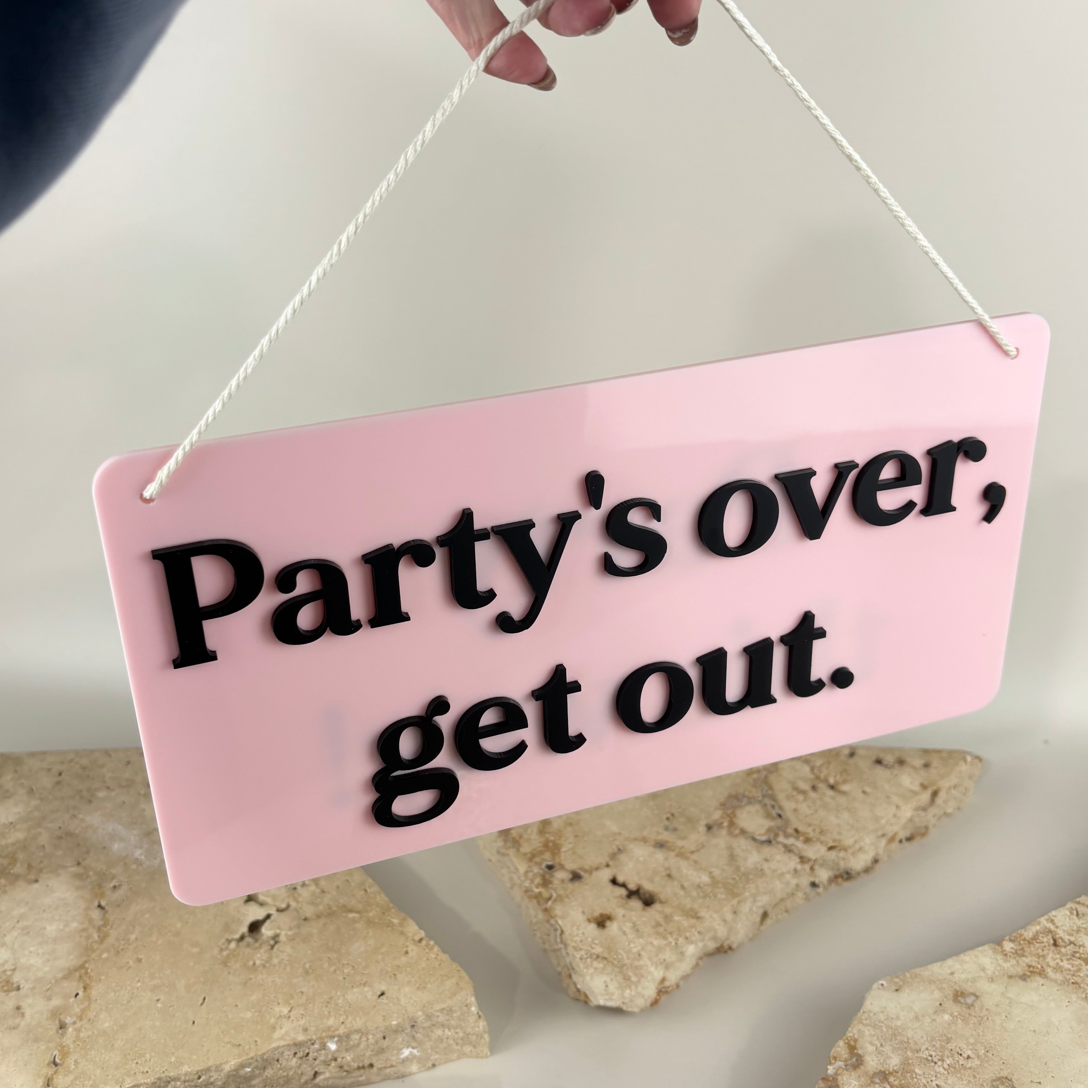 Custom acrylic party’s over sign with 3D black lettering, pink acrylic hanging sign, funny party decor sign, event exit sign, bridal shower sign, birthday party decoration, hens party signage, custom home decor plaque, hanging acrylic wall sign, reusable celebration sign, personalised event signage, modern acrylic party sign, pink and black acrylic decor.