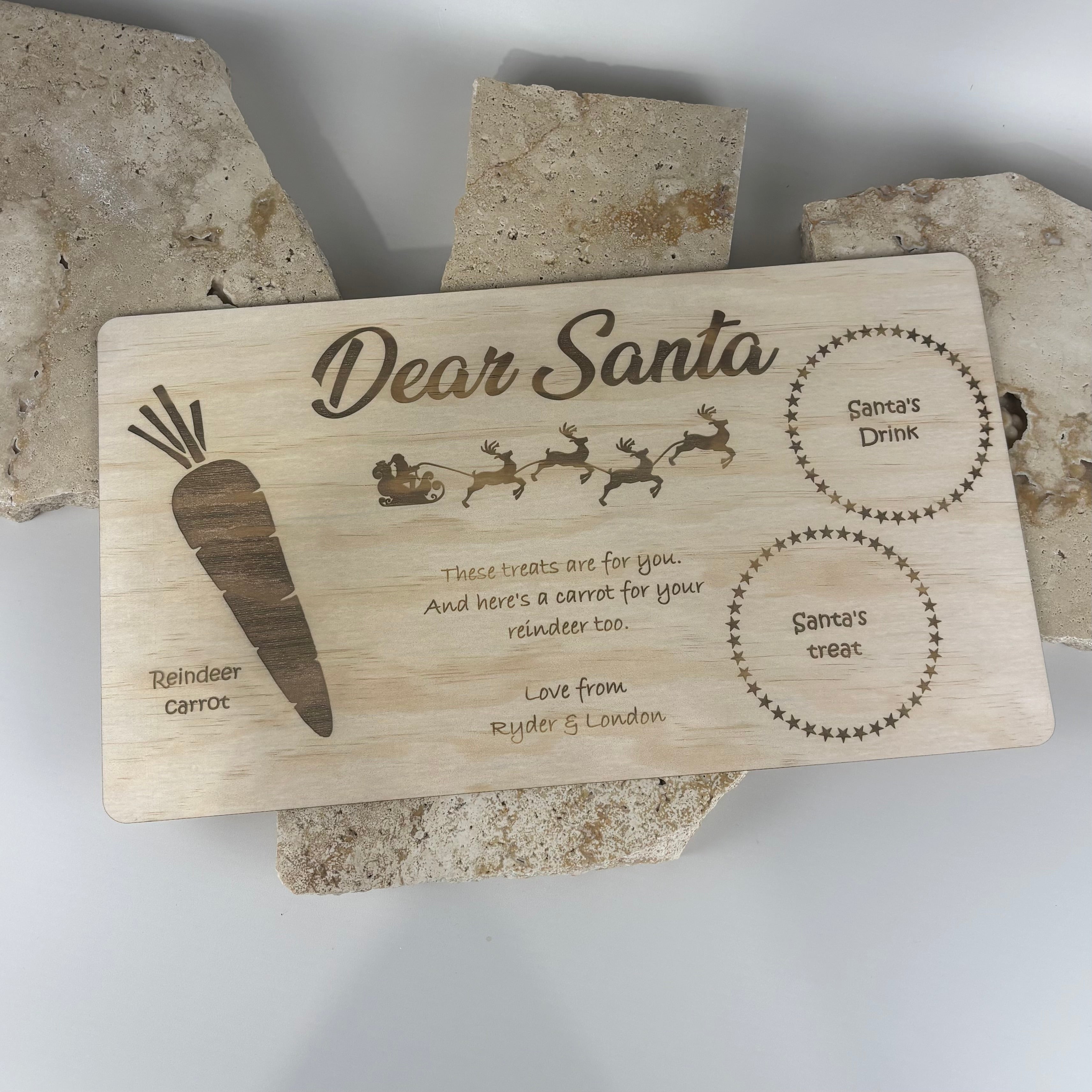 Personalised wooden Santa treat board with engraved reindeer carrot and Santa snack sections
