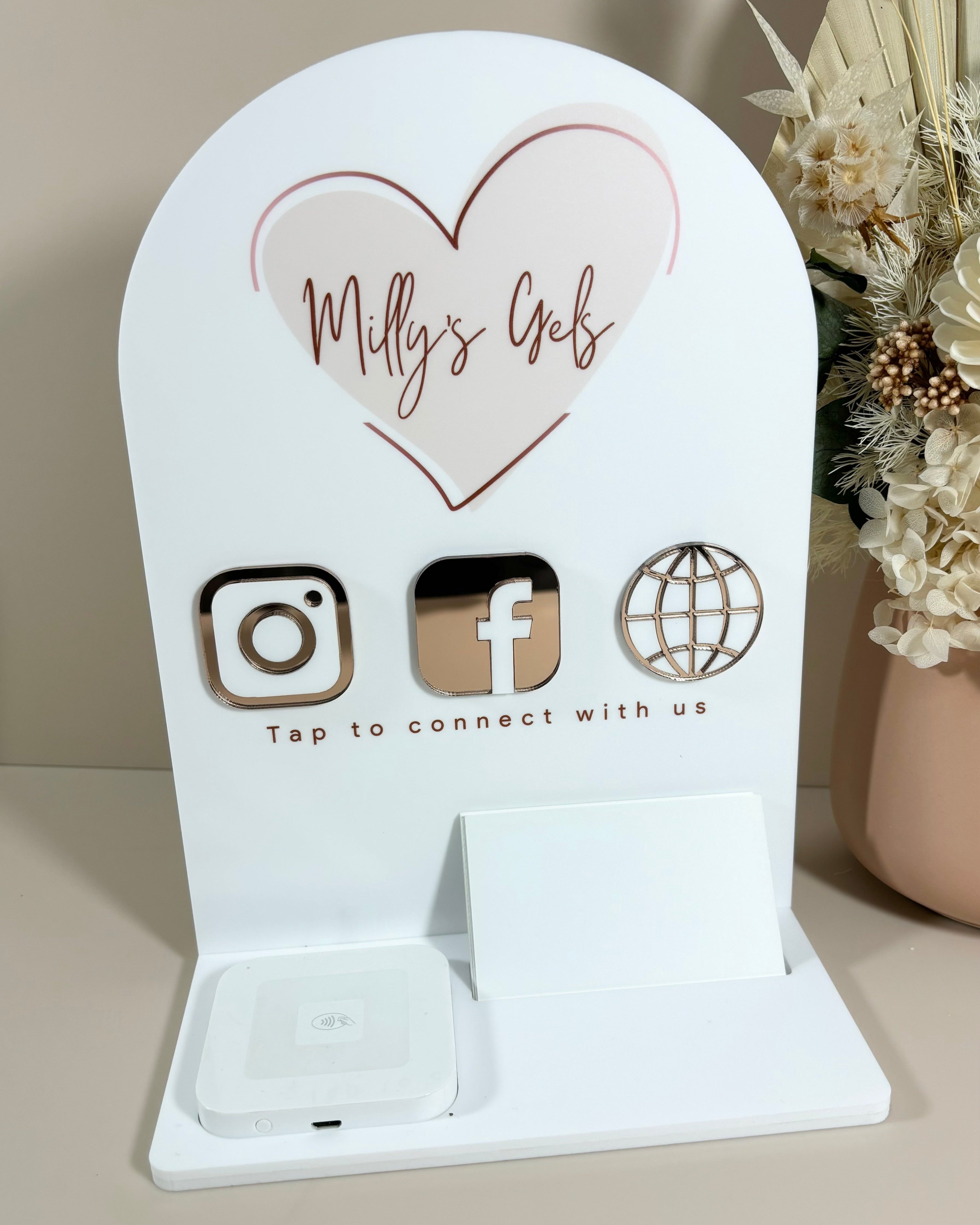 Custom NFC business station with heart logo – Millys gels brand with Instagram, Facebook and website icons.