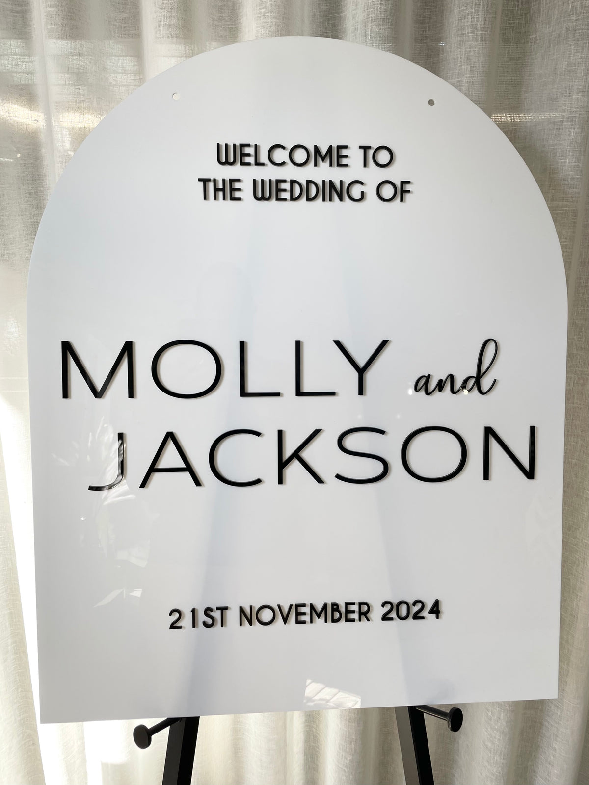 Arched wedding sign
