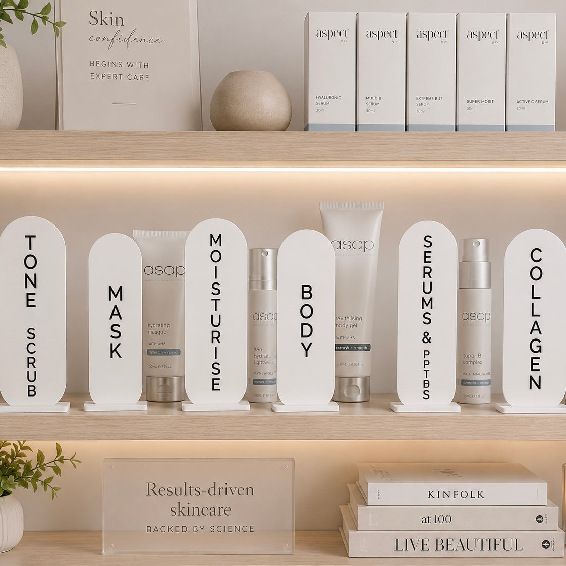     Modern acrylic arch product display stands for skincare clinics, beauty salons and cosmetic retail shelving with custom category signage labels