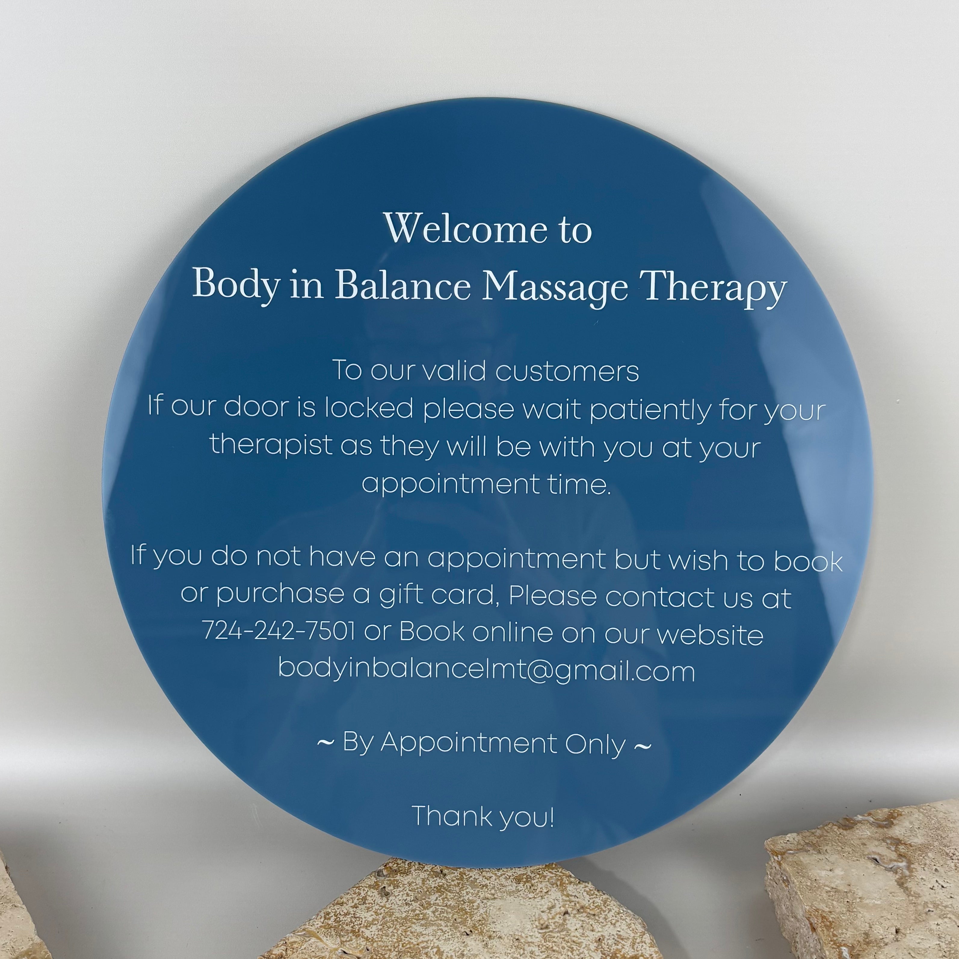 Round acrylic treatment in progress sign for massage and wellness clinics, custom printed door sign for appointment only businesses, professional locked door notice ideal for massage therapists, day spas, health clinics and private treatment rooms.