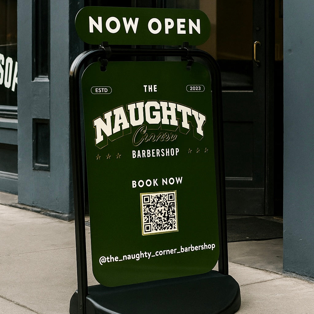 Weighted pavement swing sign with Now Open message for barbershop