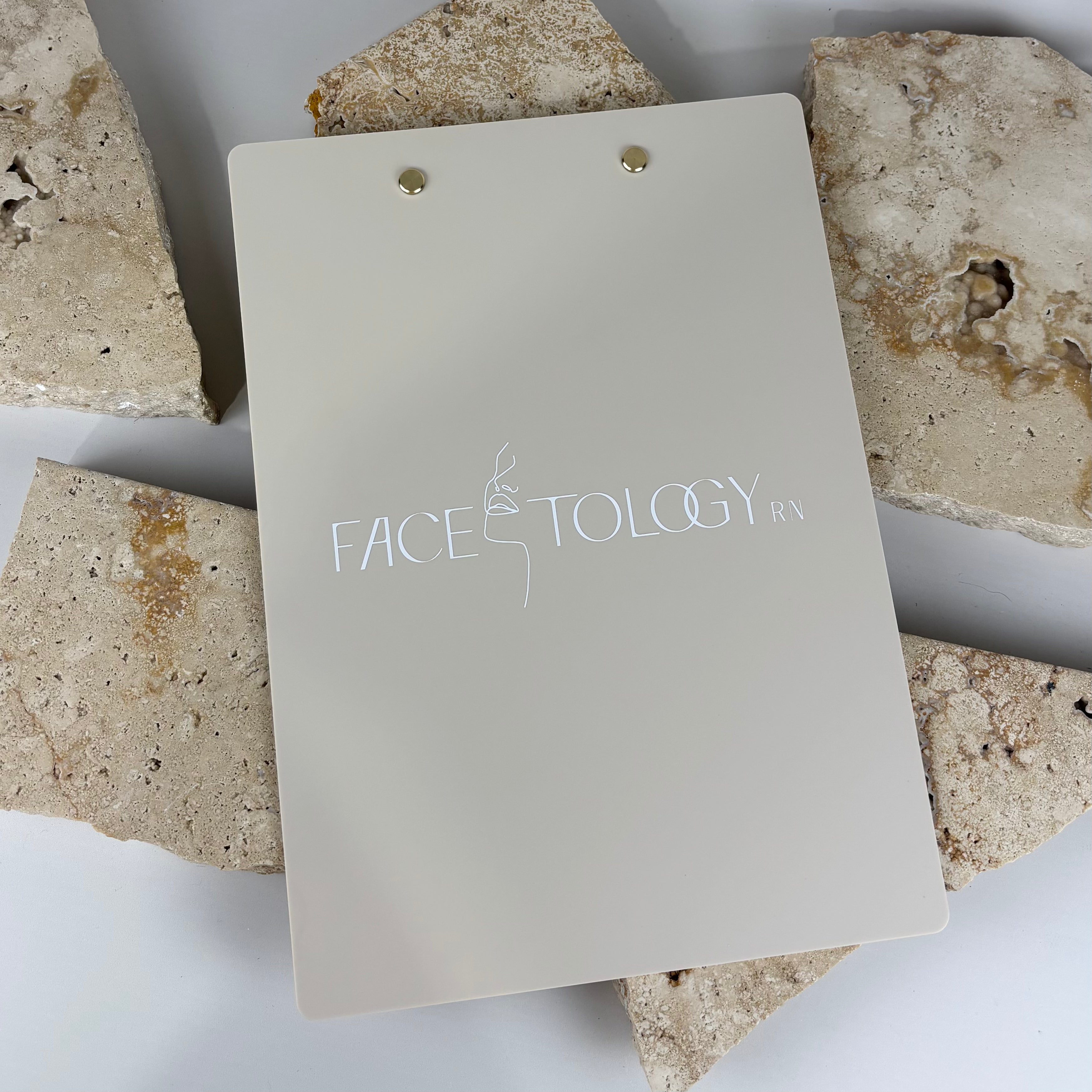 Custom branded acrylic clipboard with printed business logo, premium neutral clipboard for salons, clinics and beauty studios, professional client consultation clipboard ideal for reception desks, treatment rooms and small business workspaces.