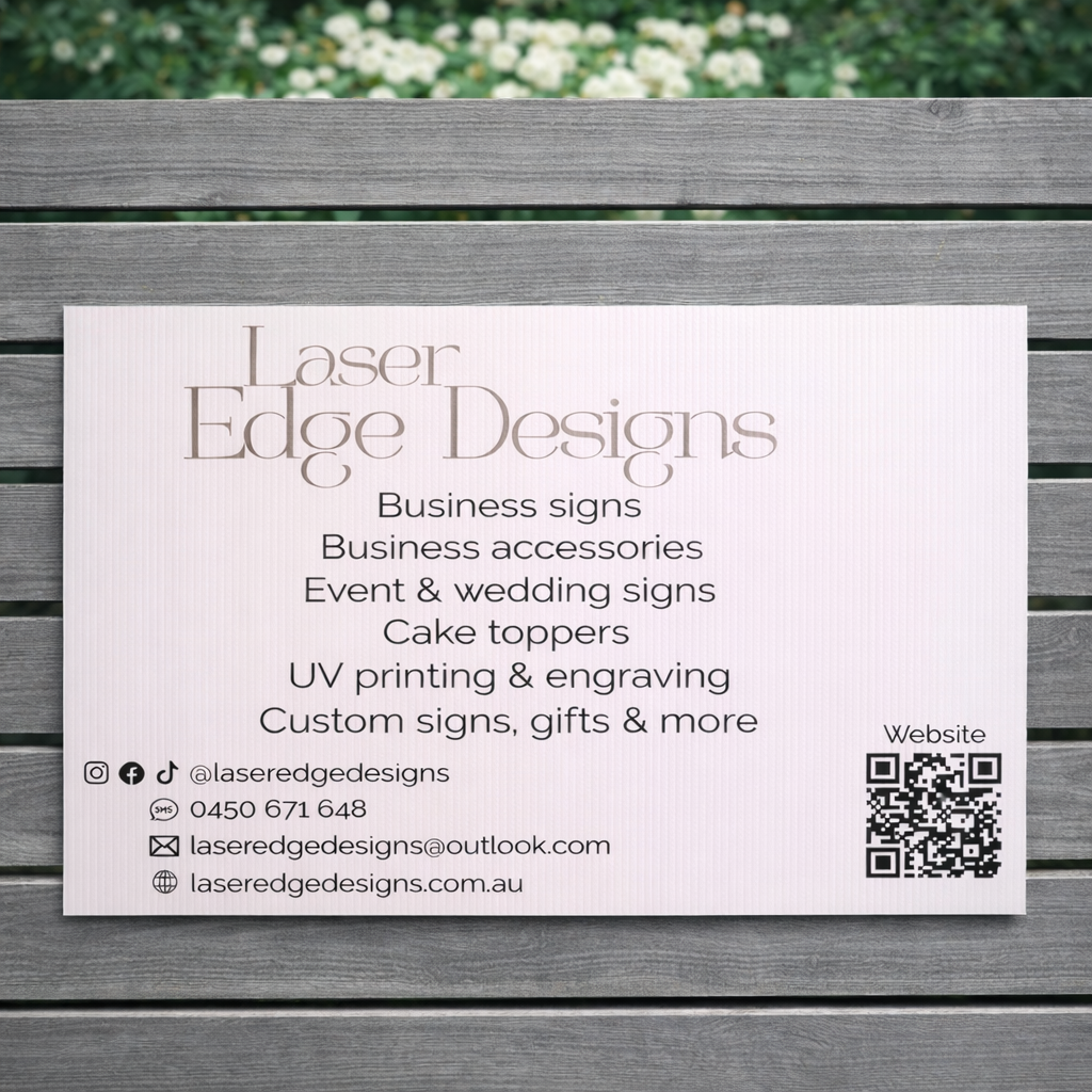 Rectangle corflute business sign mounted on a grey horizontal fence, Laser Edge Designs custom signage advertising business signs, event signs and UV printing