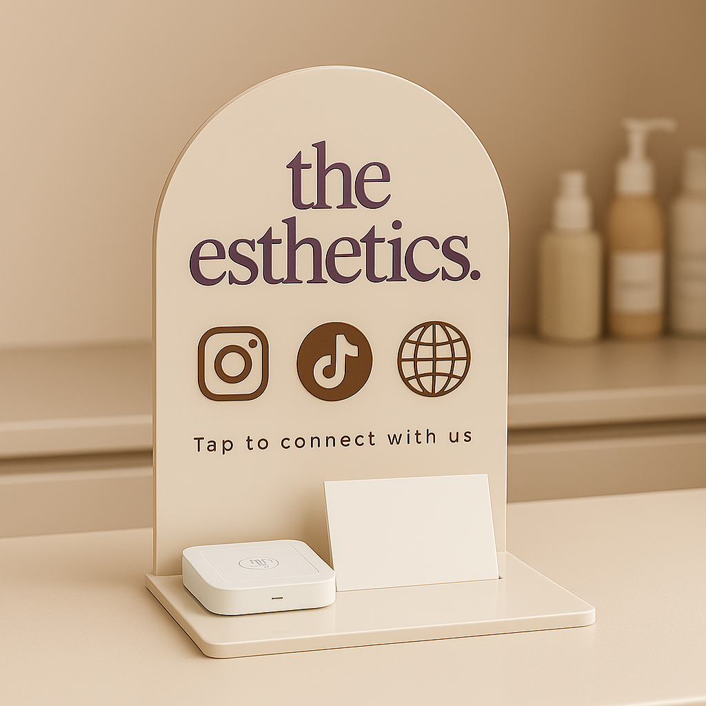 NFC business station with square dock and card holder – custom branded for The Esthetics salon with social media icons.
