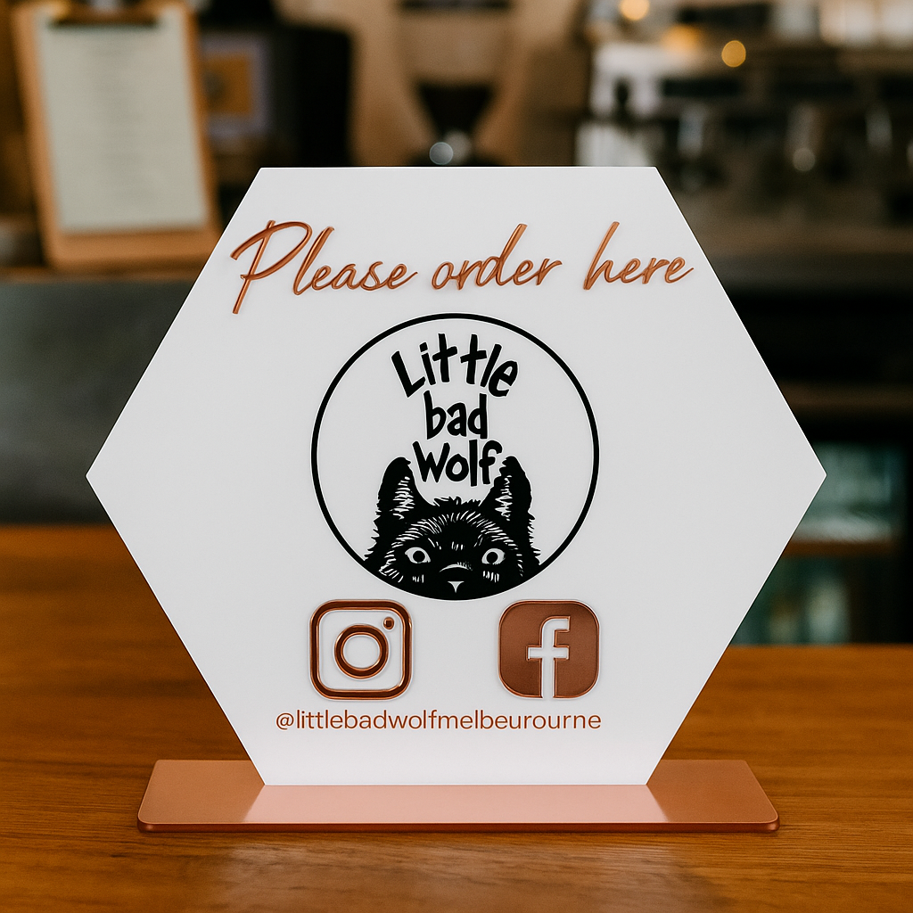 Hexagon acrylic social media stand with QR codes and Instagram and Facebook icons for business counters