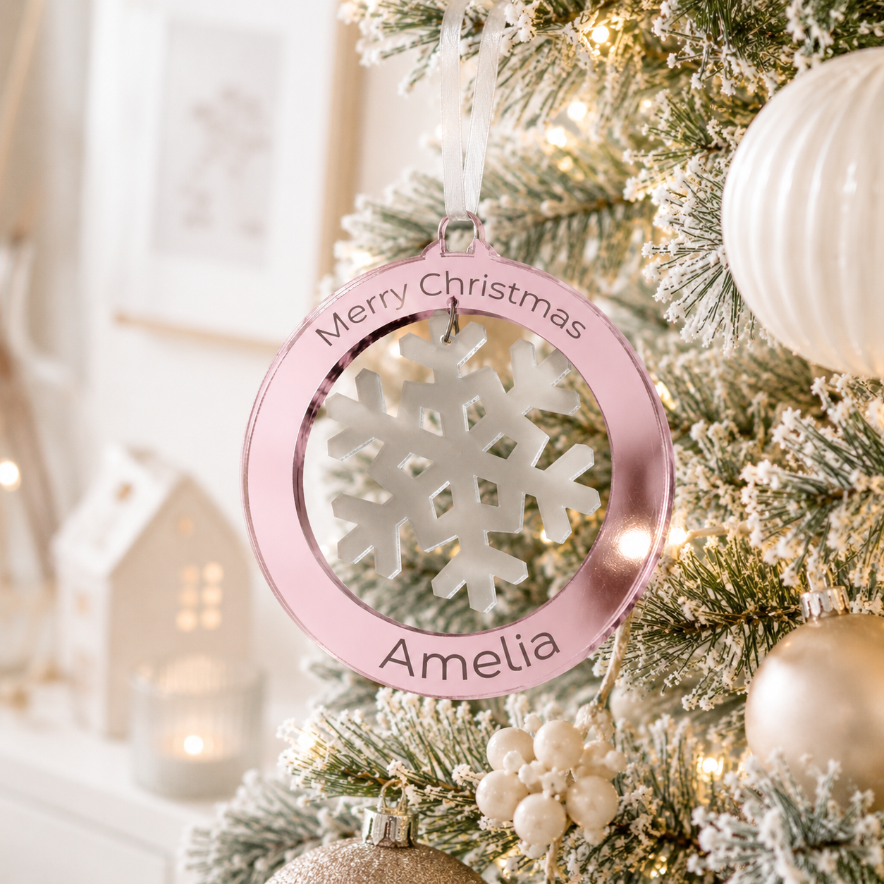 Personalised pink mirror acrylic Christmas bauble with hanging silver snowflake, custom name and Merry Christmas design, modern tree ornament.