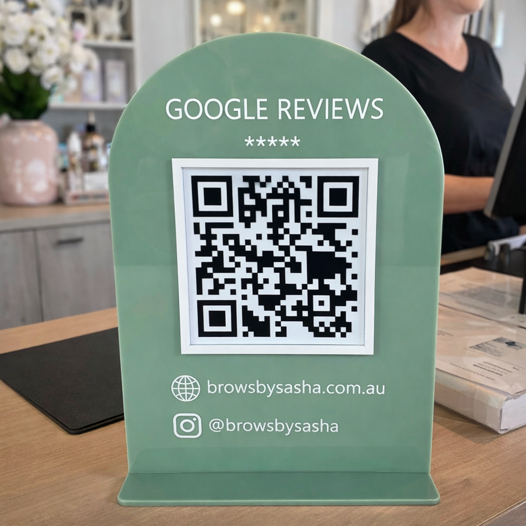 White acrylic QR code and NFC WiFi sign displayed on a counter, contactless internet access stand for hospitality and business use
