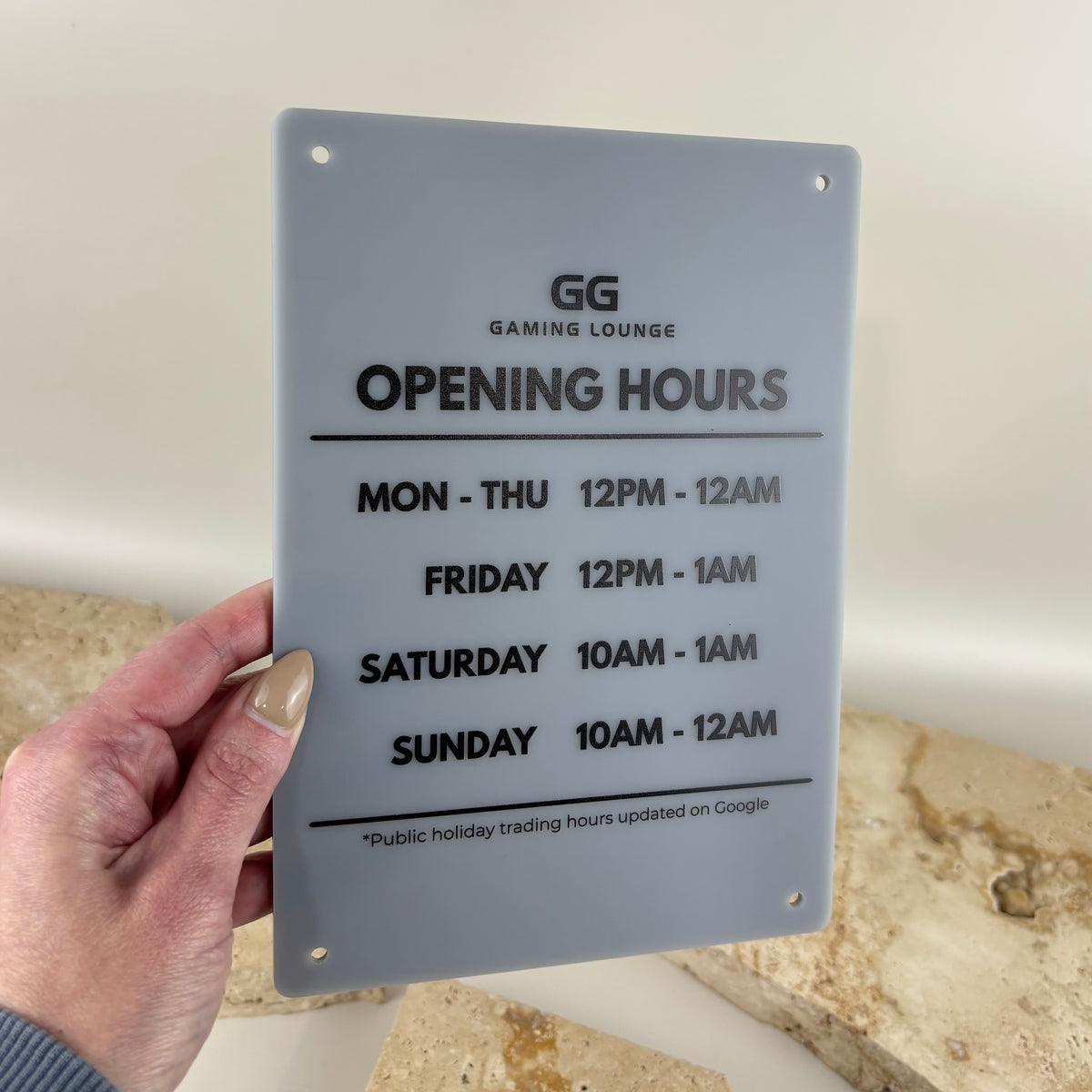 Custom acrylic opening hours sign with business logo and trading hours, designed for display at shopfronts, reception areas and business entrances.