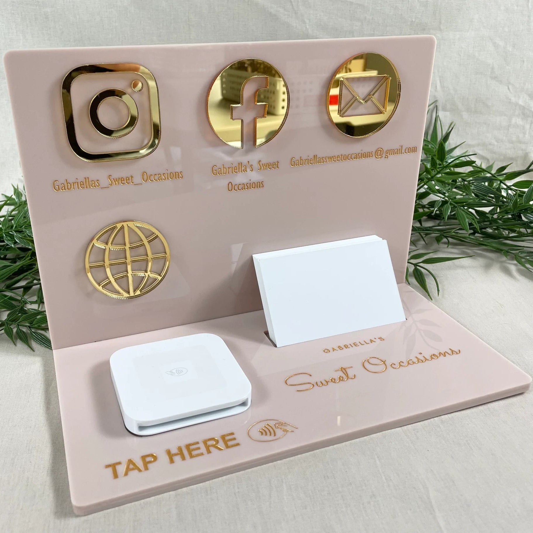 Pink acrylic business station with engraved Instagram and Facebook