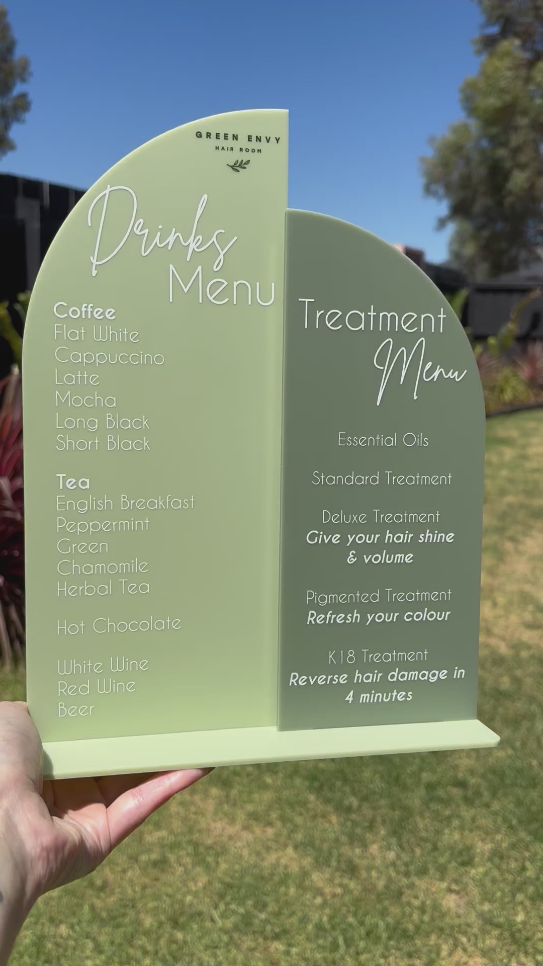 Green double-sided acrylic drink and treatment menu for spa or clinic display. Video