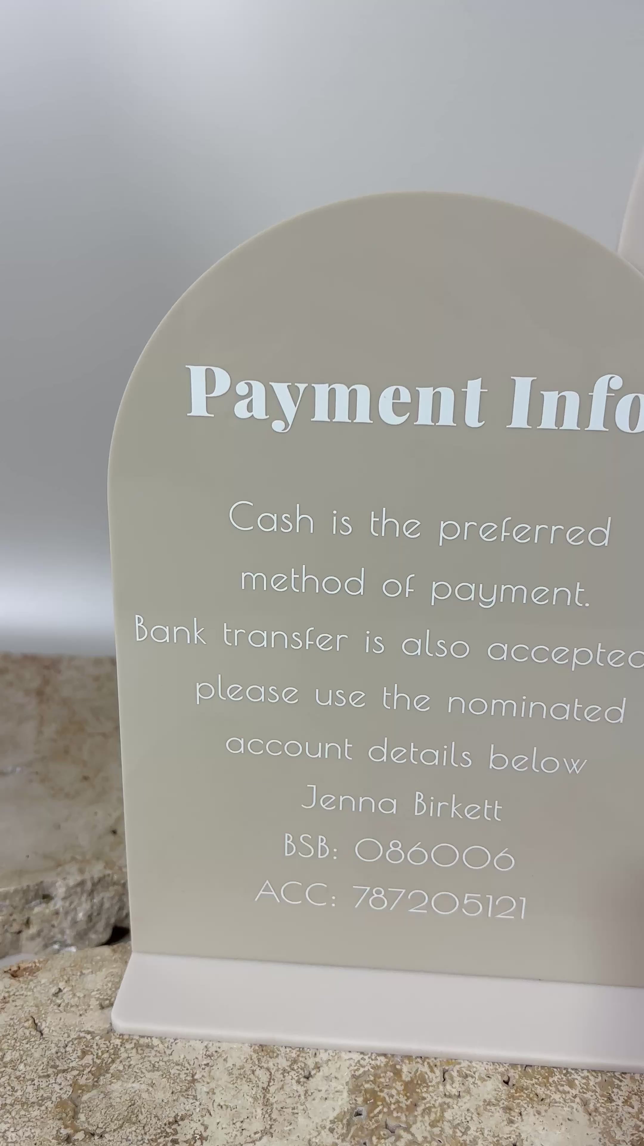 Beige acrylic drink menu and payment info display board. Video